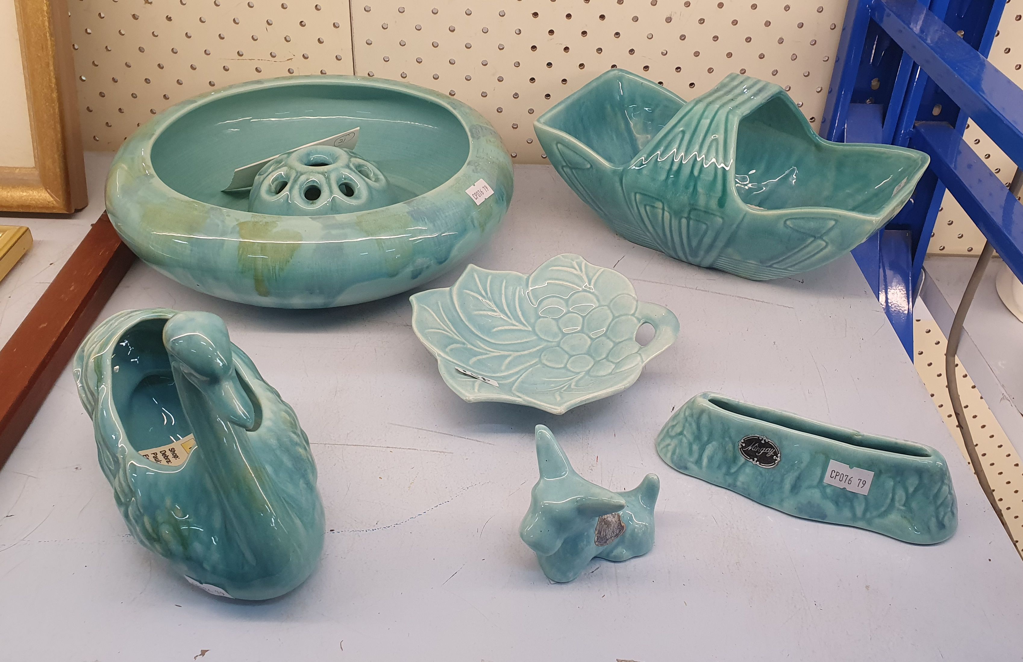 A Group Of Mcp Mingay Pieces In Teal