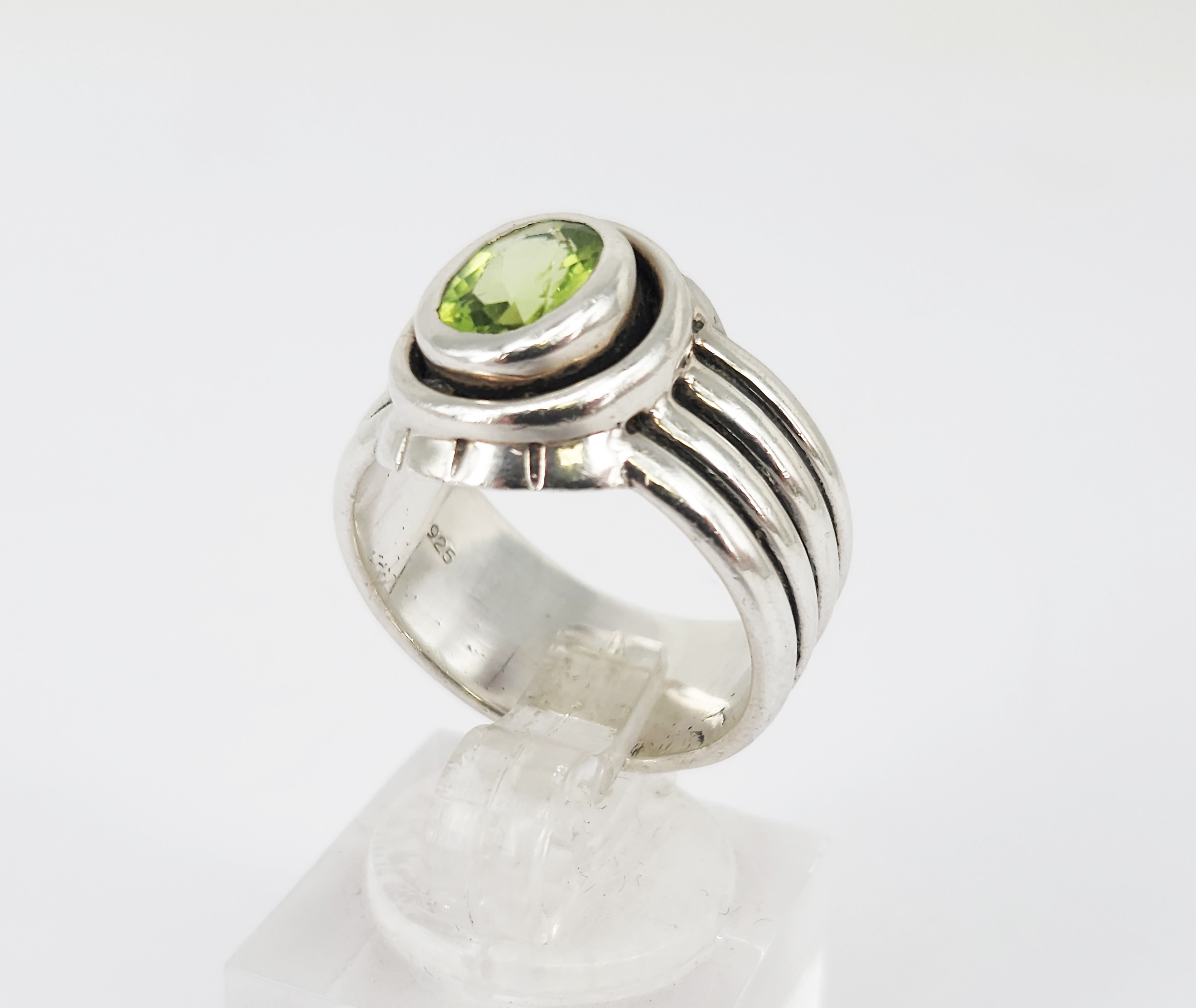 A Silver And Peridot Ring