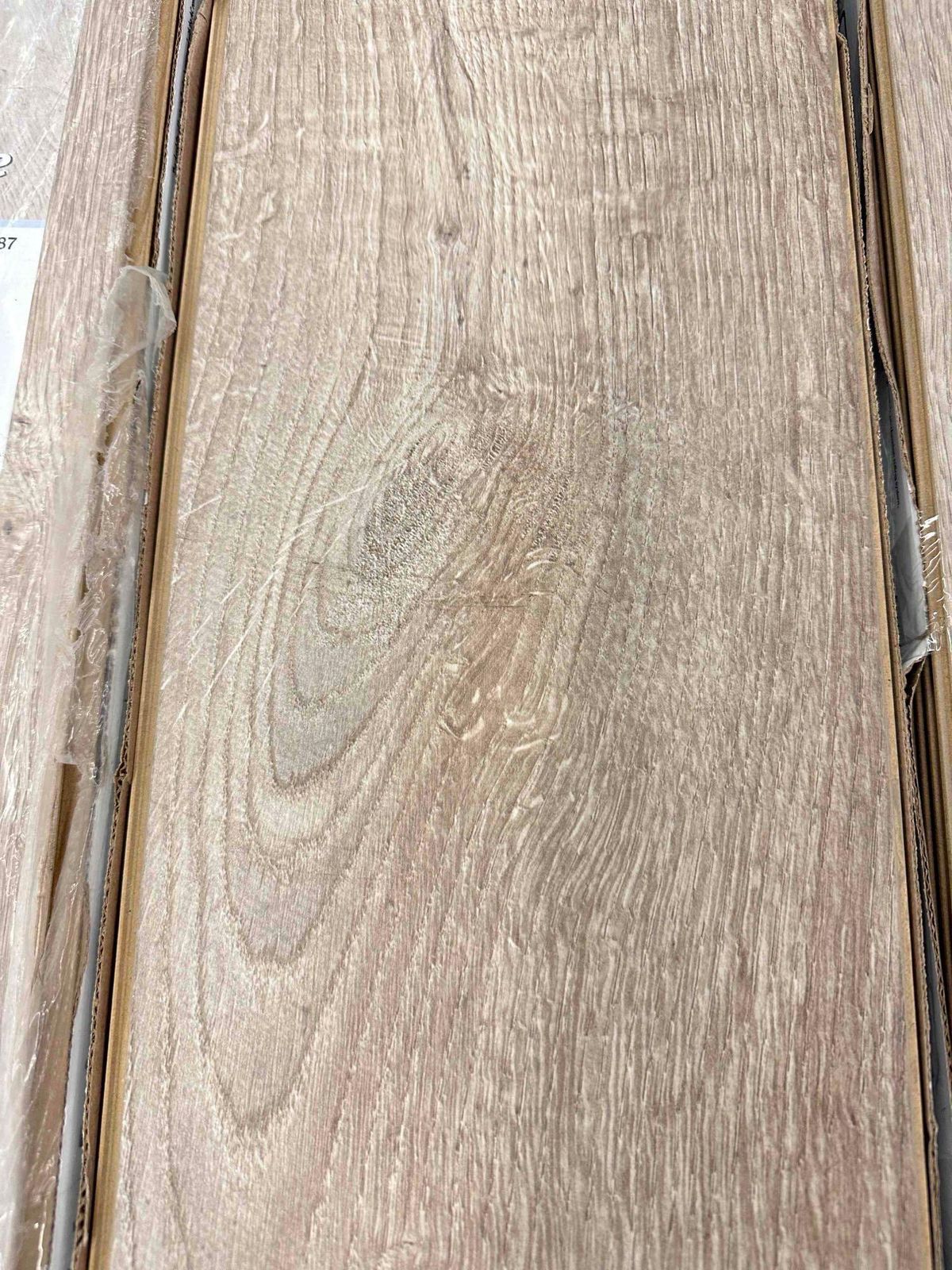 TrafficMaster Oak Knoll 8 mm T x 7.5 in. W Water Resistant Laminate