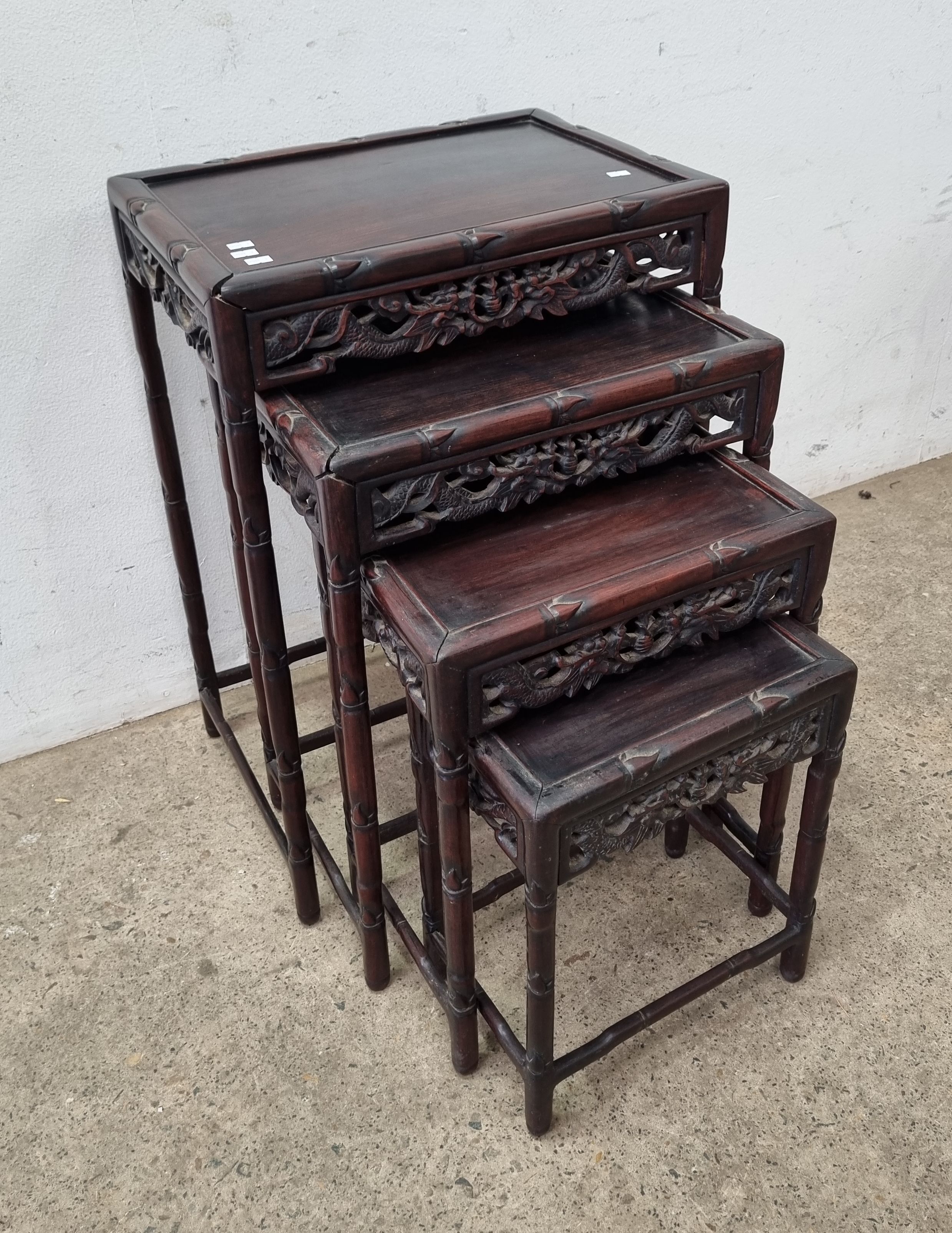 A Set Of Oriental Rosewood Nesting Tables