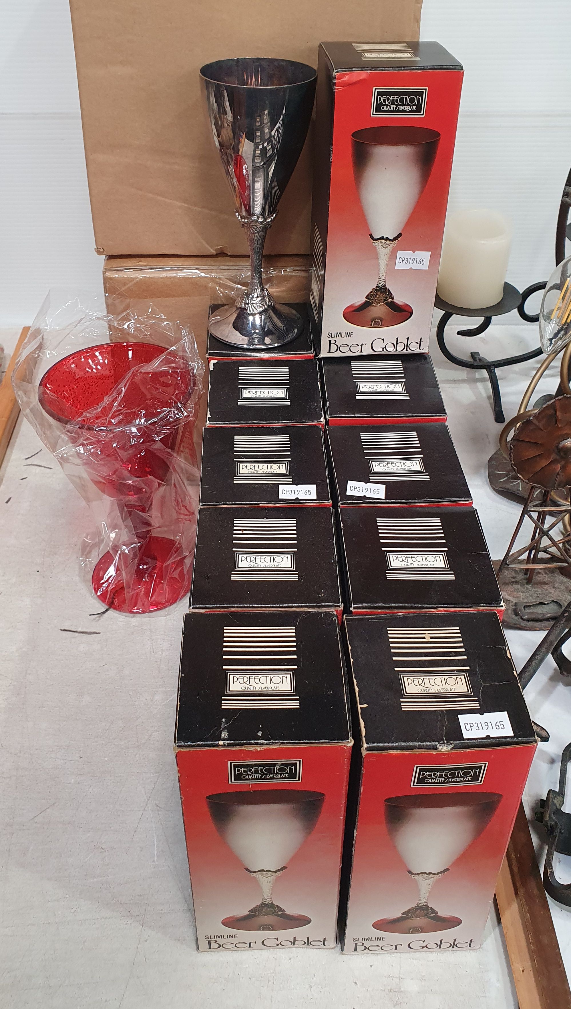 396 · A COLLECTION OF TWELVE ELECTROPLATED BEER GOBLETS