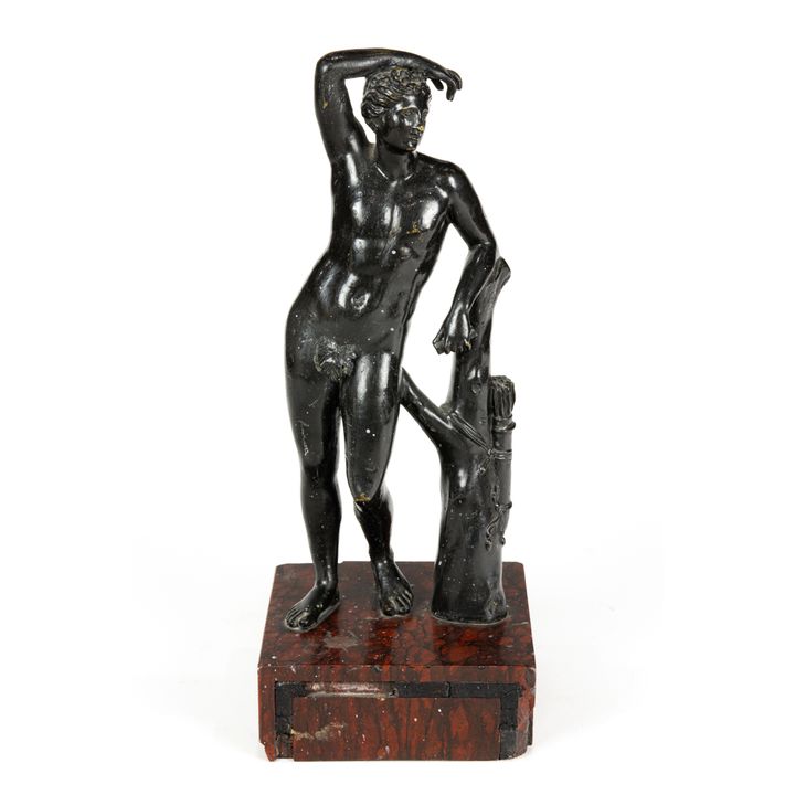 An Italian patinated bronze figure of Apollo