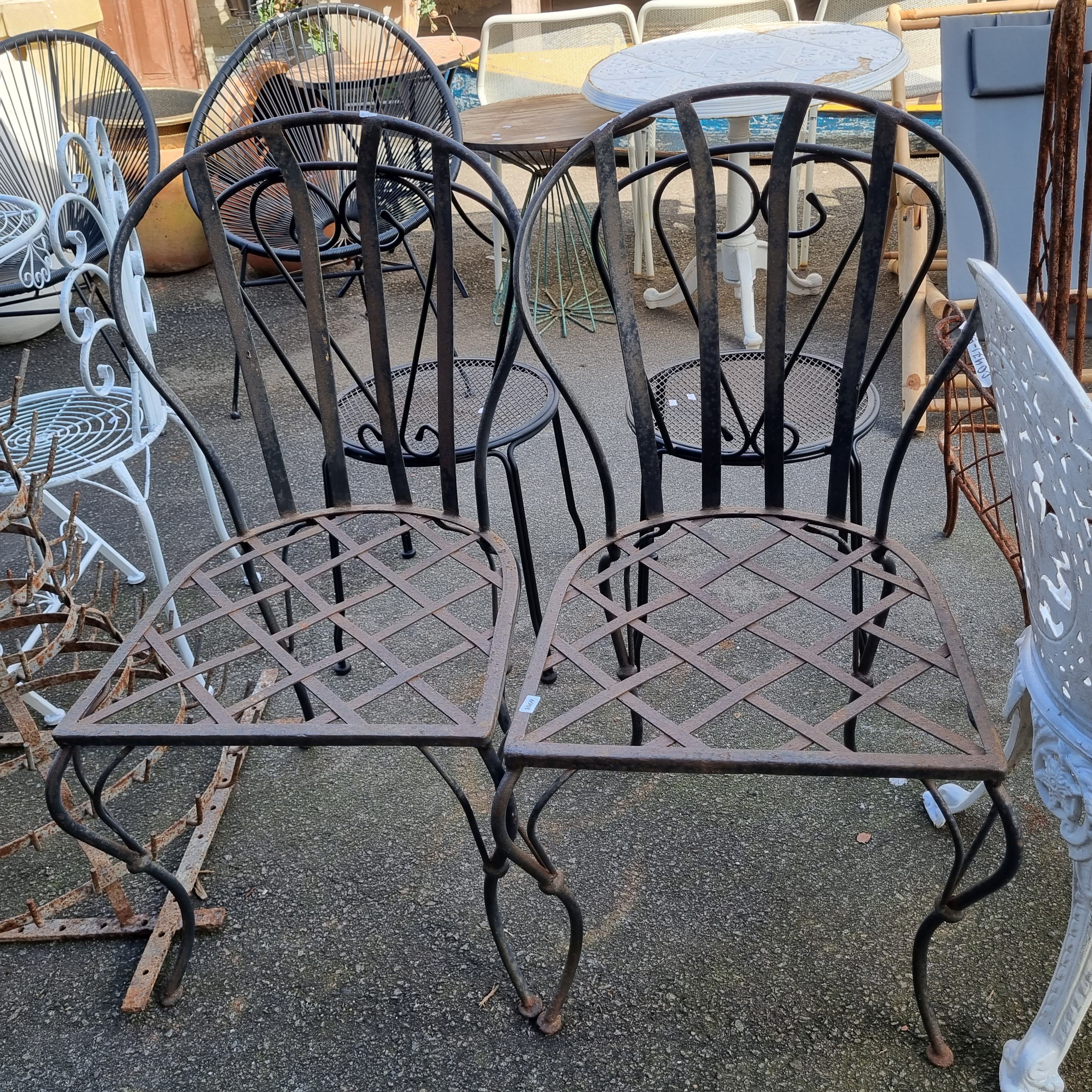 Two Wrought Iron Outdoor Chairs