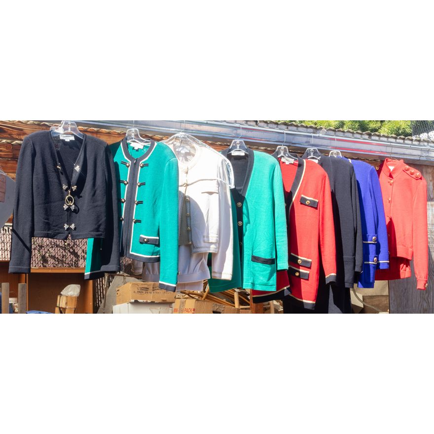 A collection of vintage St. John knit ladies' suits and jackets