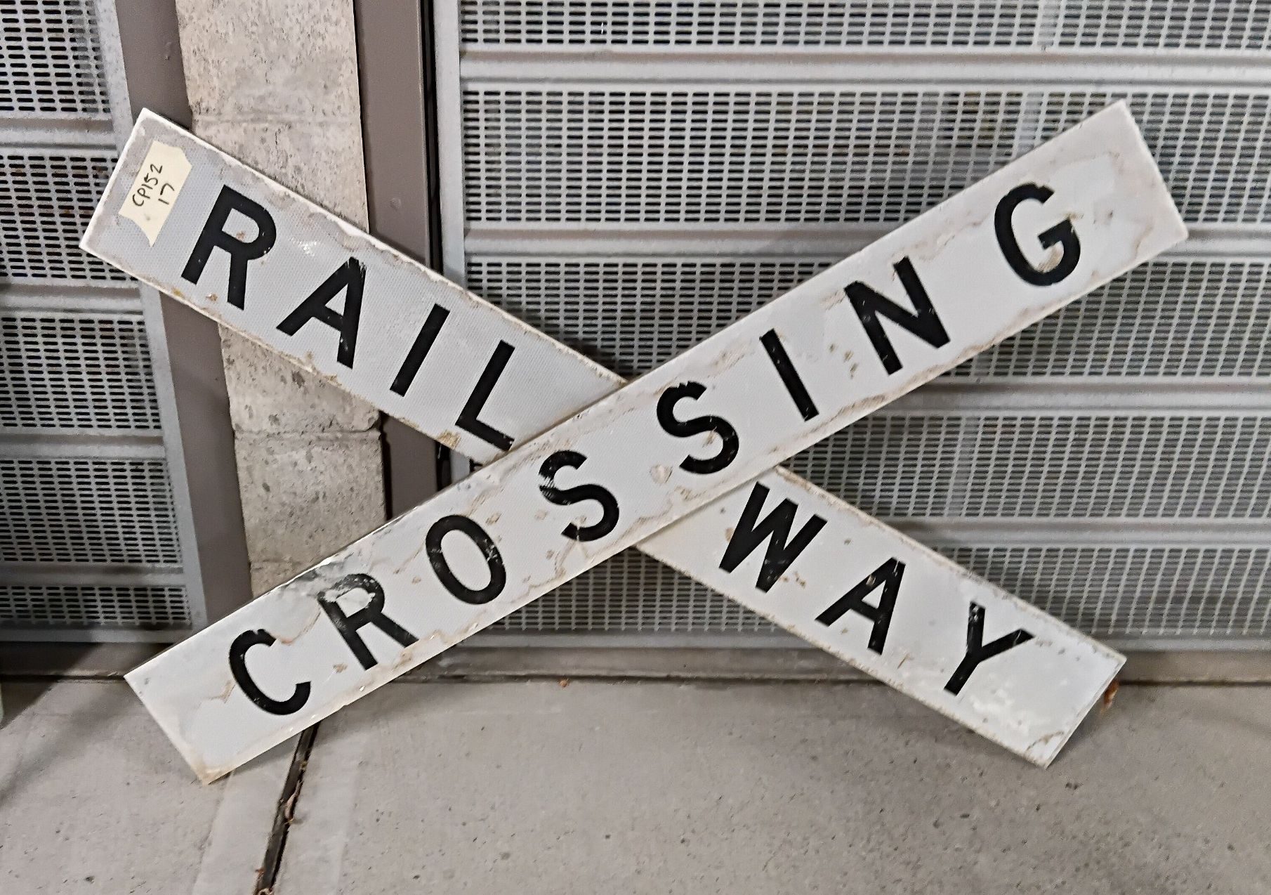 1137 · A METAL RAILWAY CROSSING SIGN