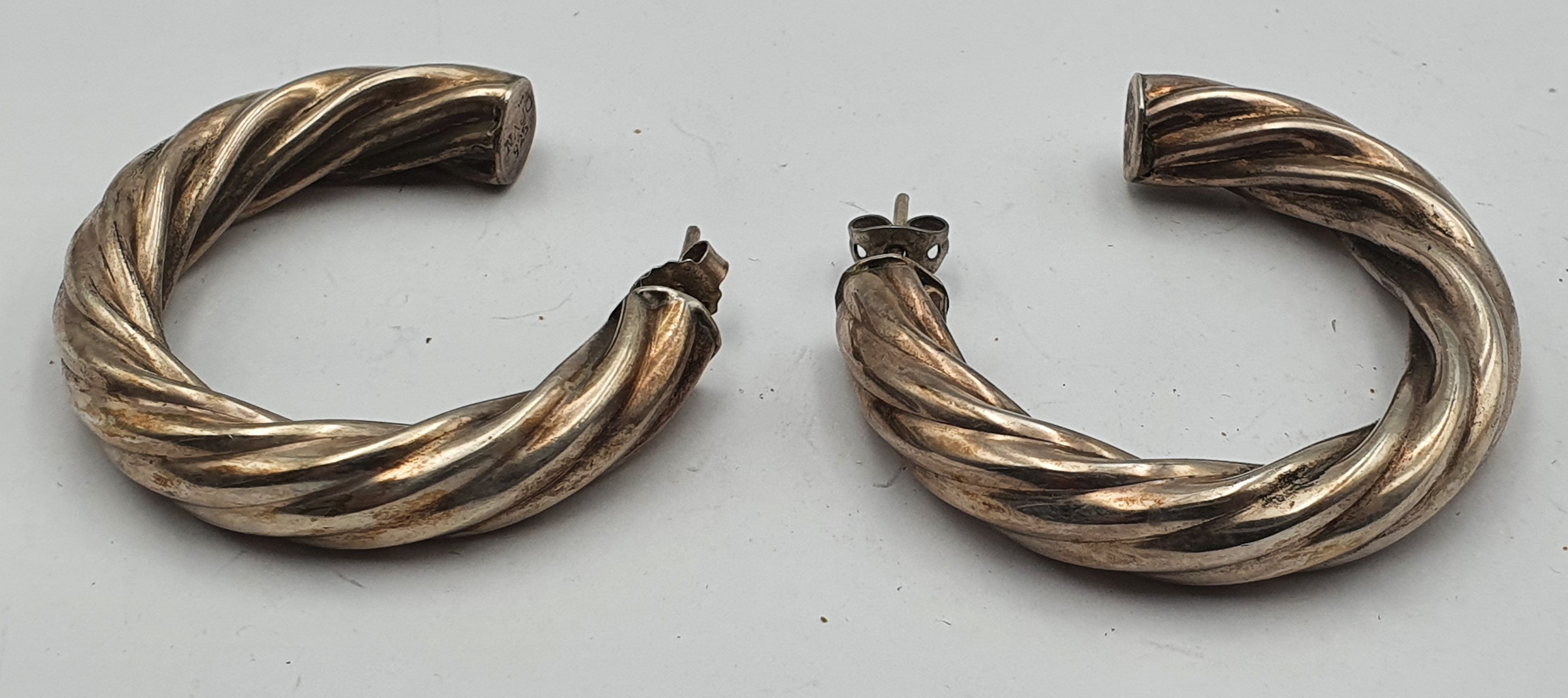 332 · A PAIR OF SILVER NAJO EARRINGS