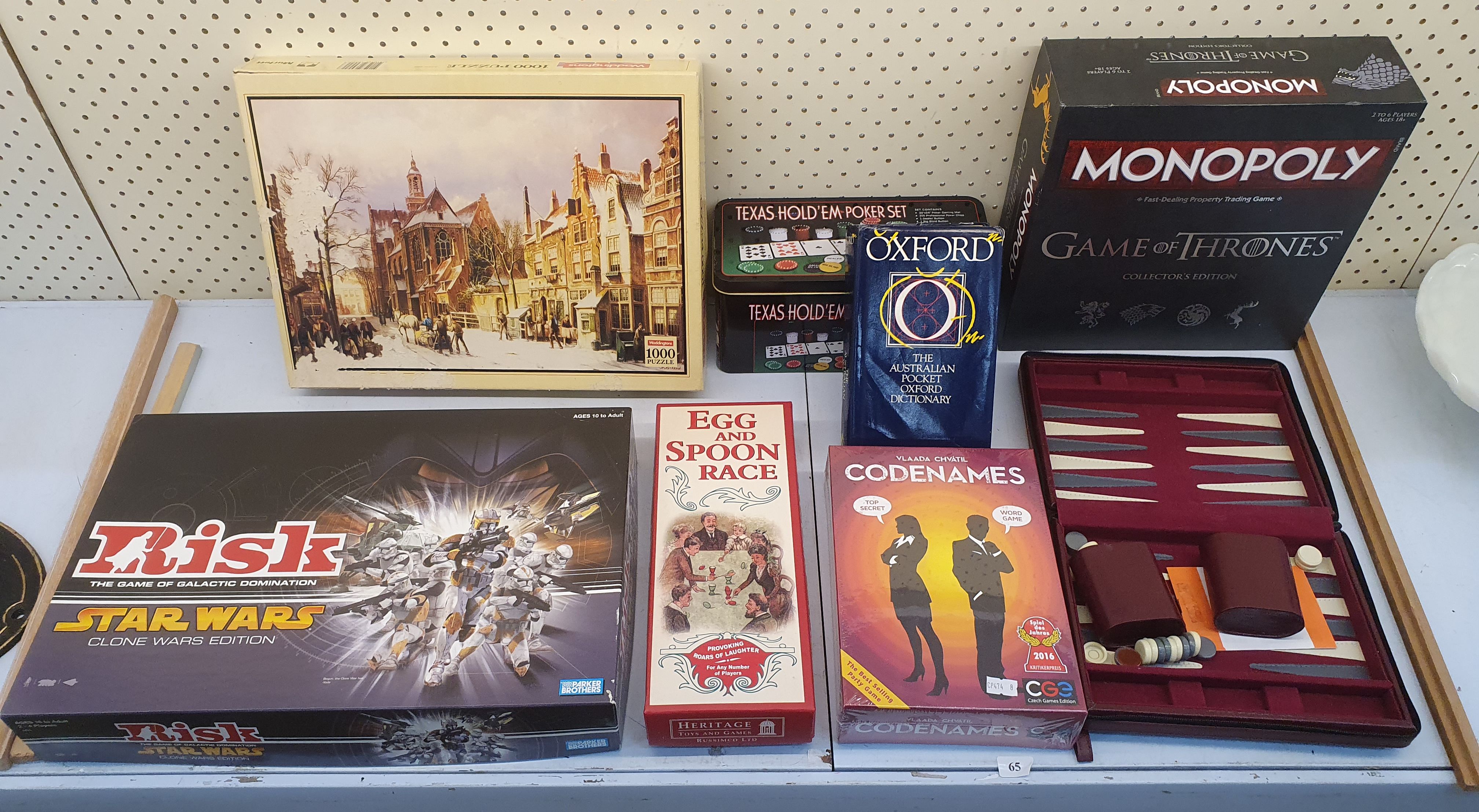 A Group Of Board Games And Other Items