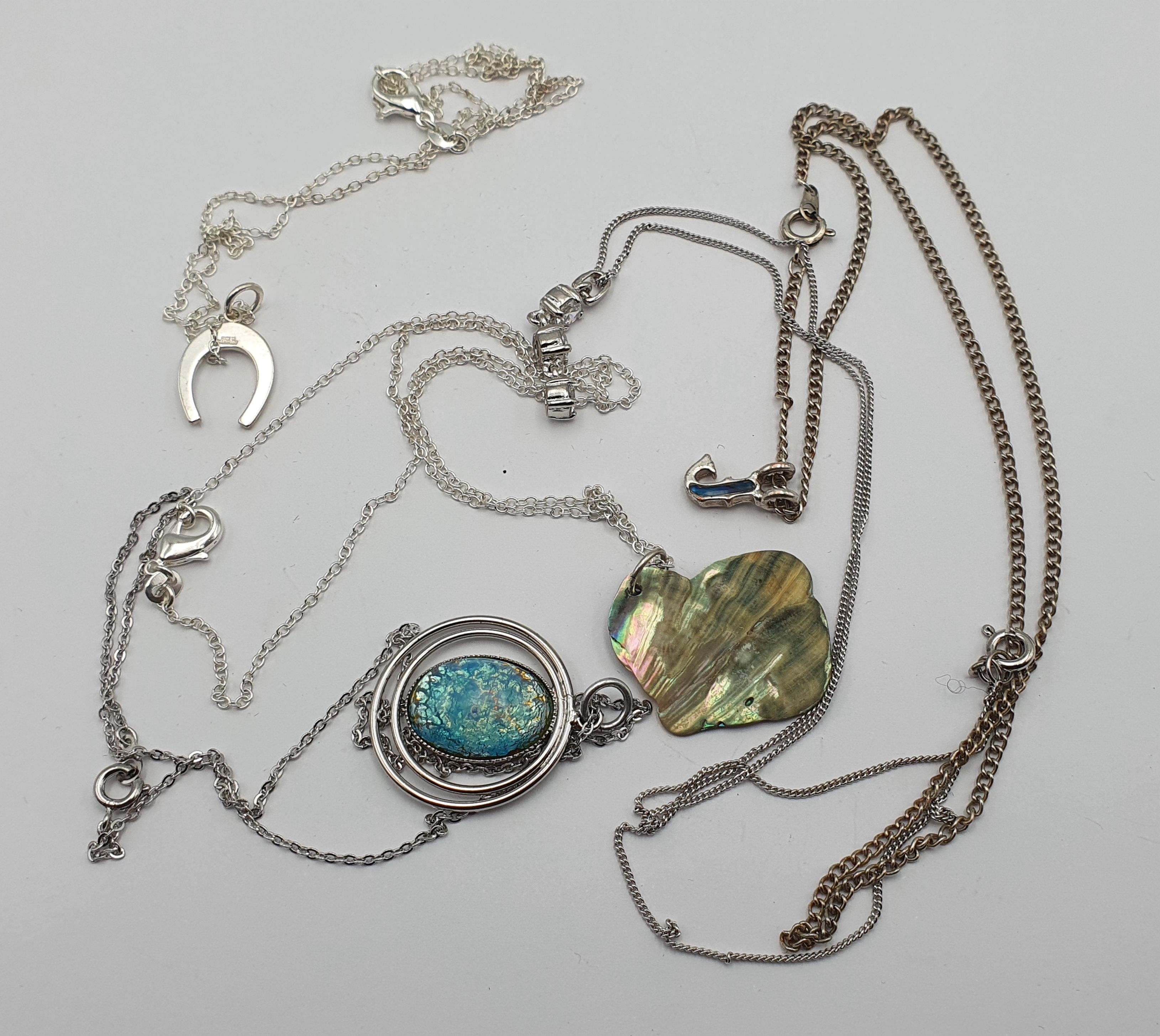 370 · FIVE PENDANT NECKLACES