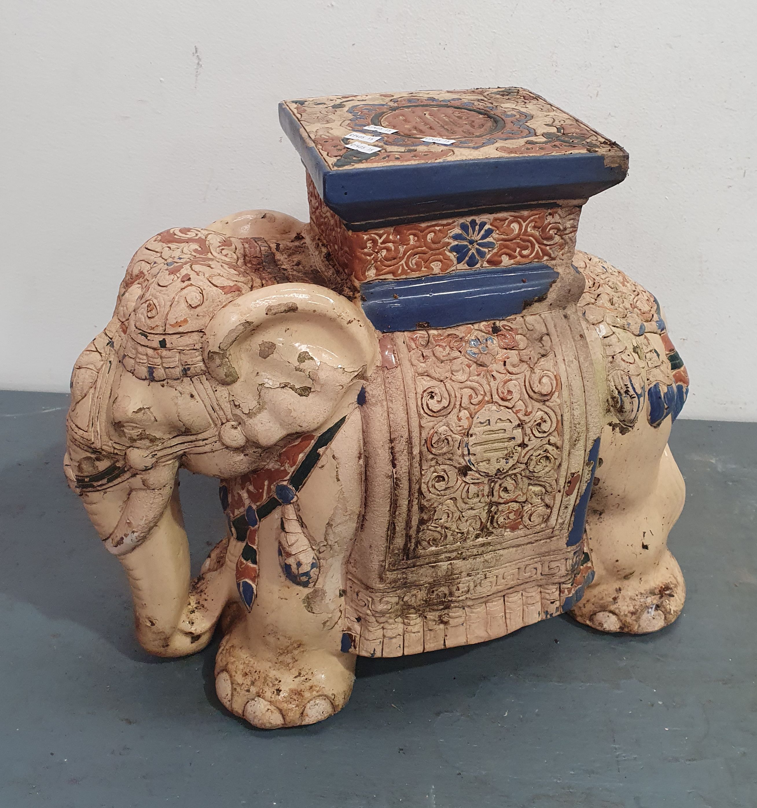 1100 · A CERAMIC GLAZED ELEPHANT
