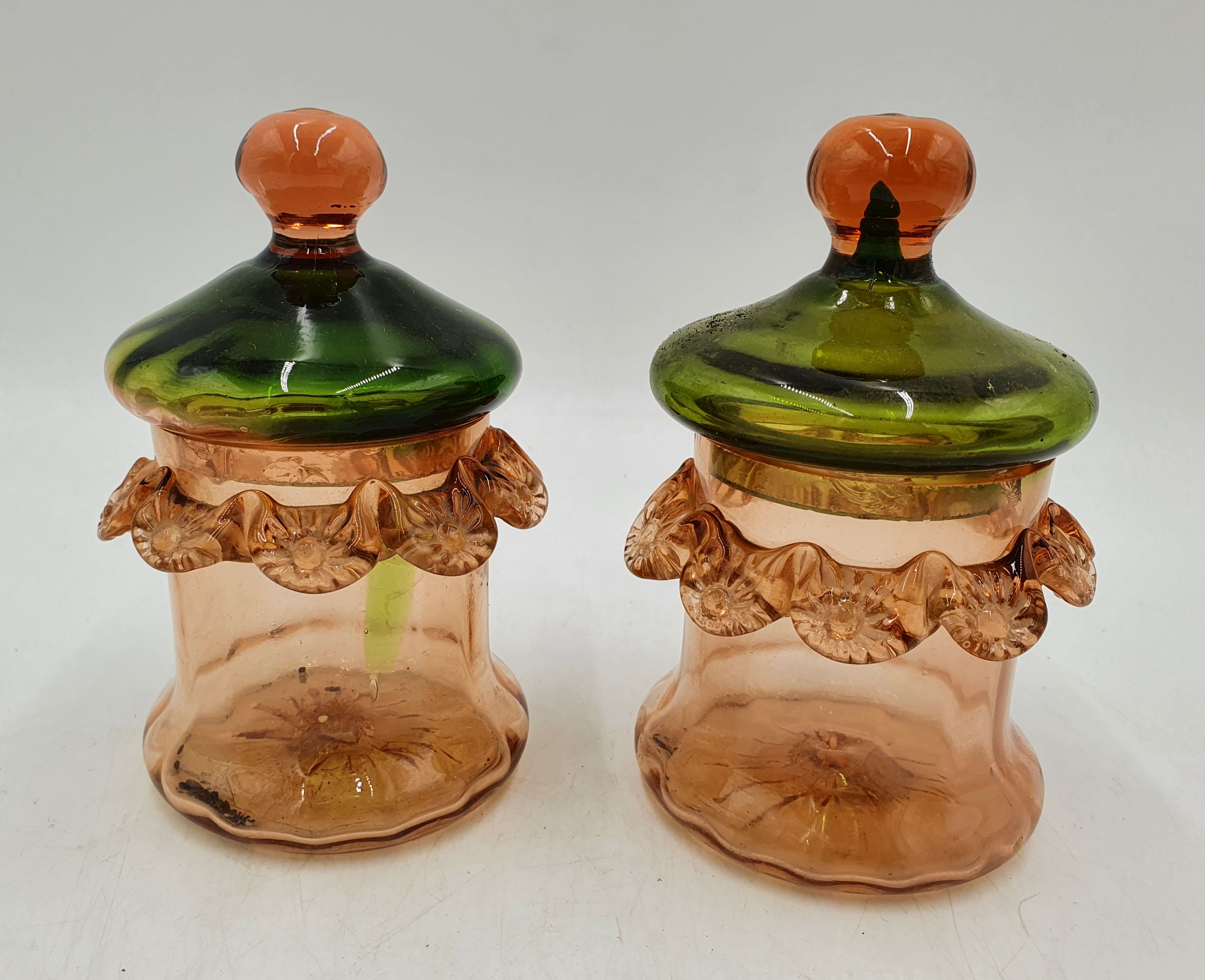 A Pair Of Peach And Green Lidded Vanity Jars