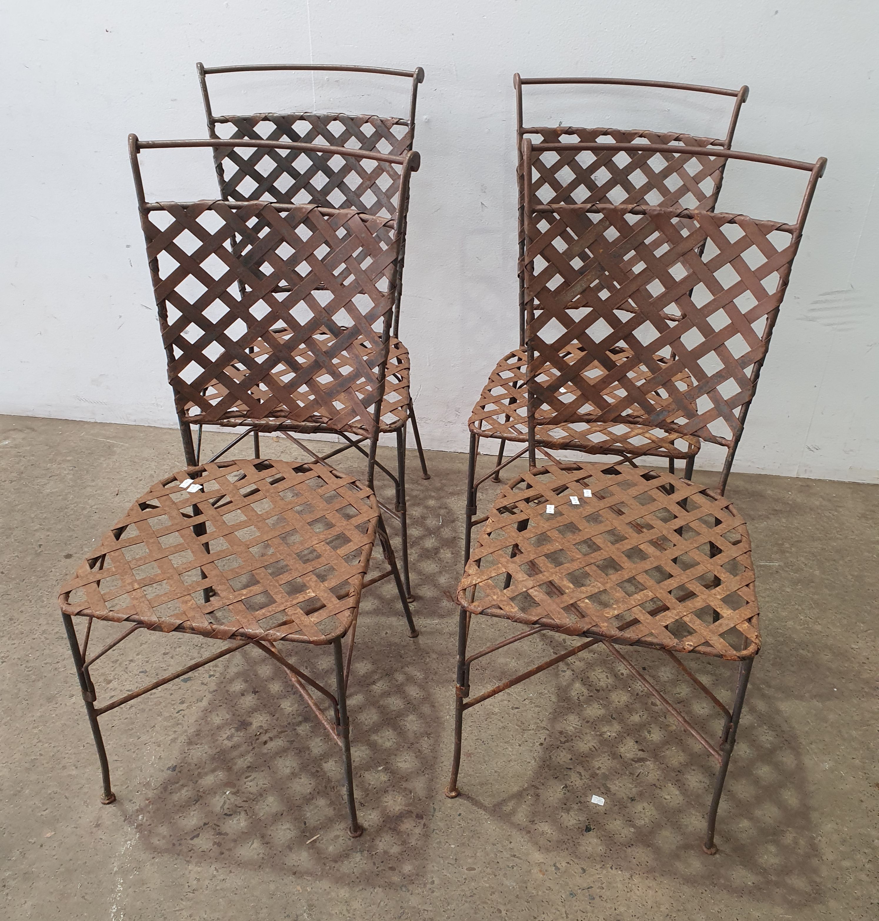 Four Wrought Iron Chairs
