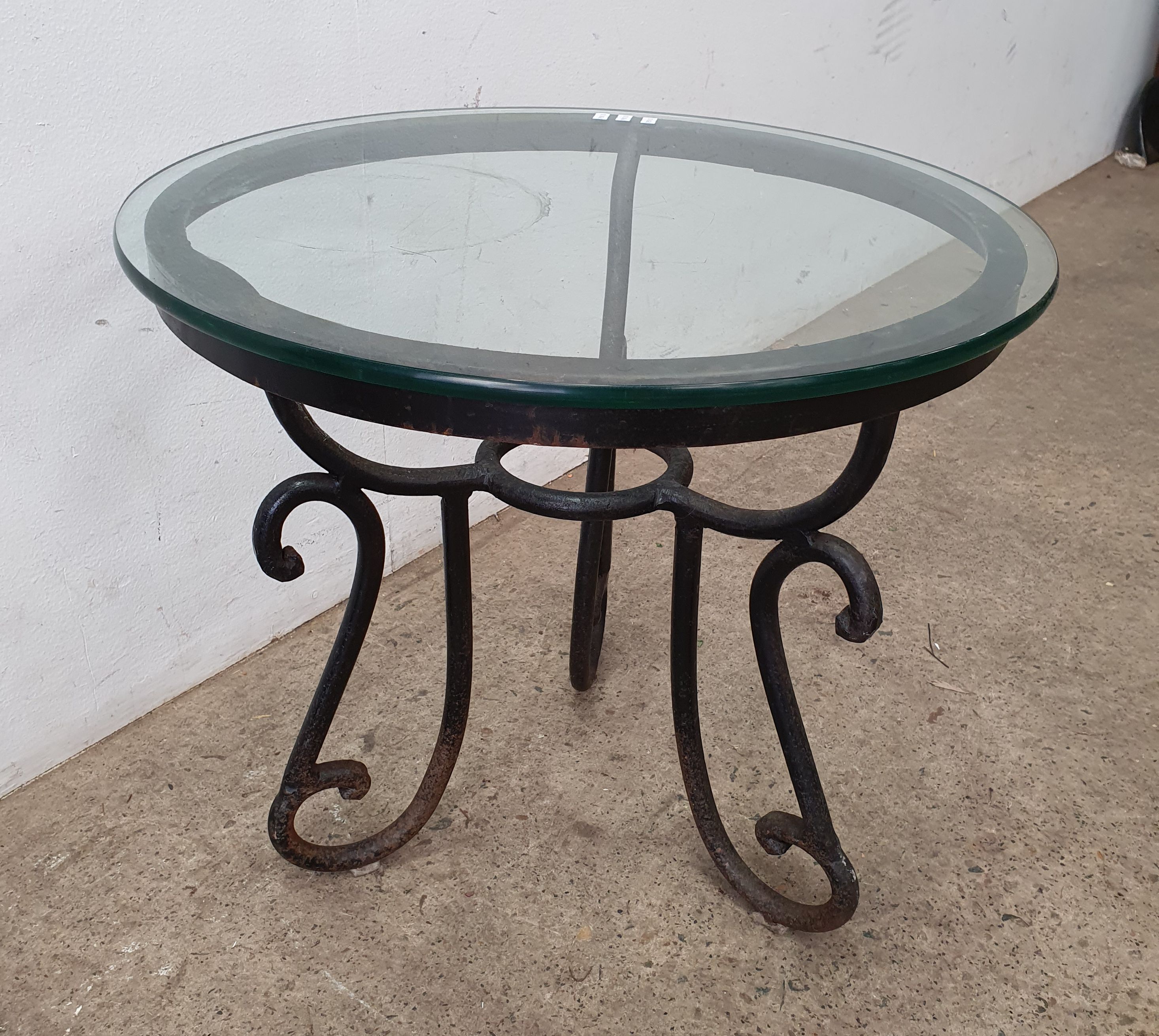 AN OUTDOOR CIRCULAR TABLE