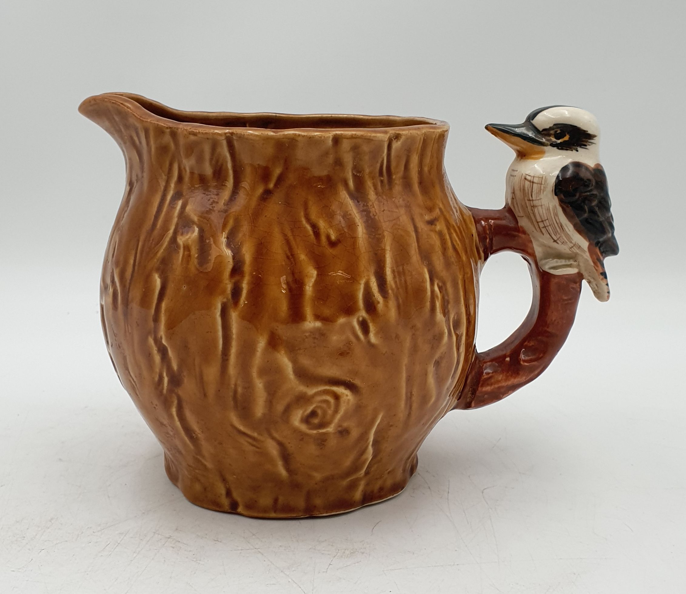 504 · A VINTAGE JAPANESE POTTERY KOOKABURRA JUG