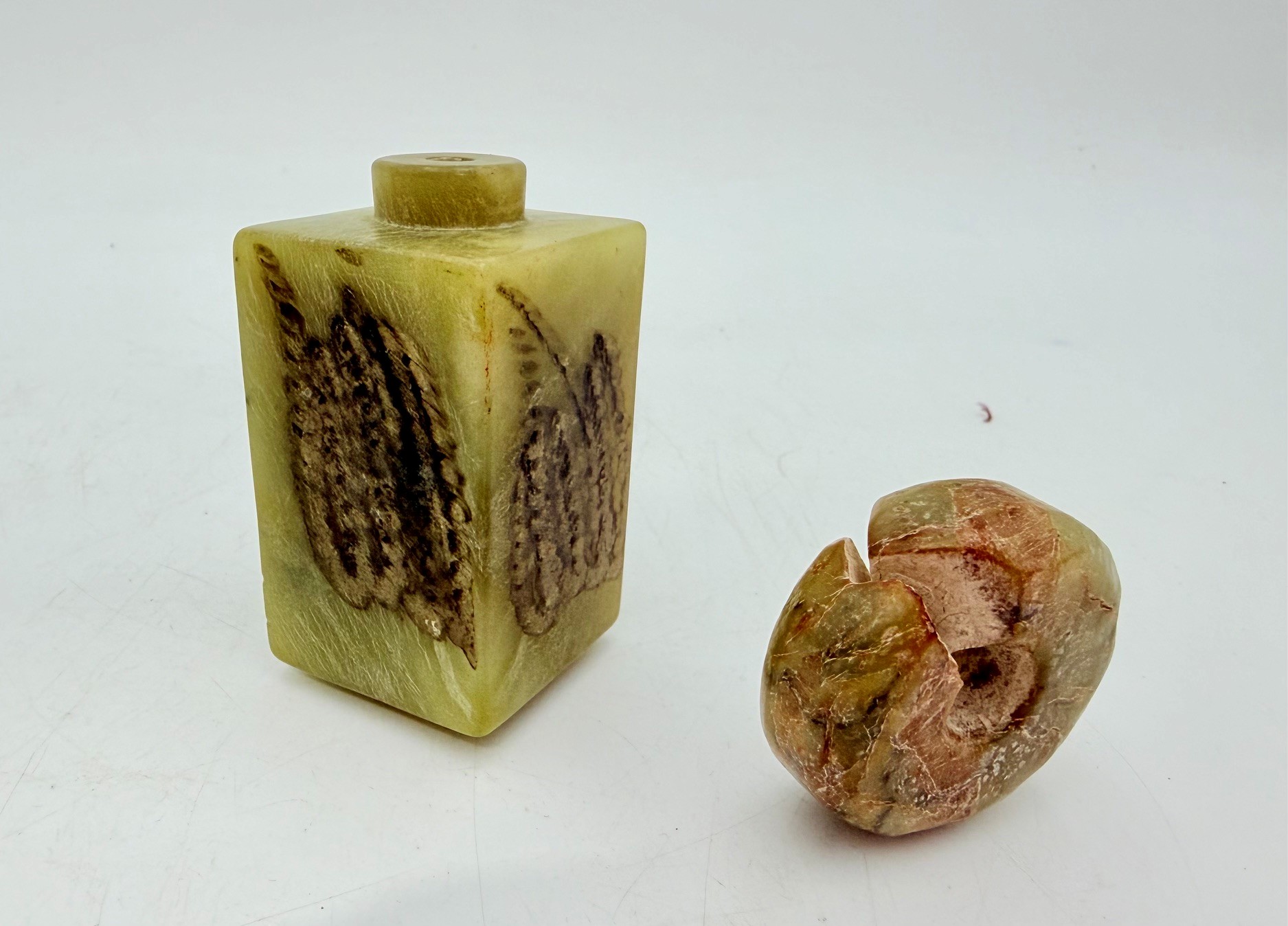 518 · TWO CHINESE CARVED ZHULONG JADE ITEMS