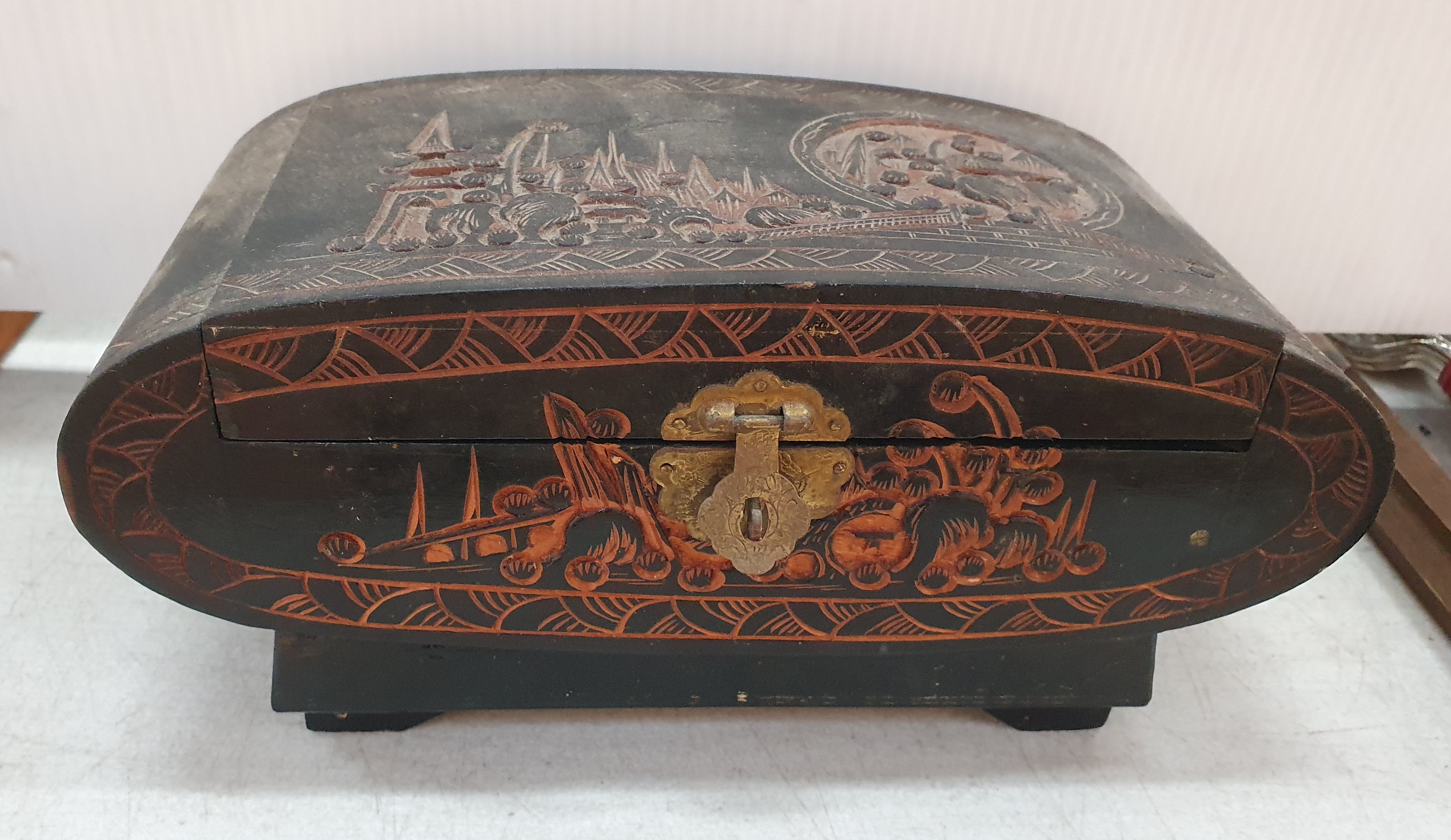 30 · A VINTAGE EAST ASIAN HAND CARVED WOODEN JEWELLERY BOX
