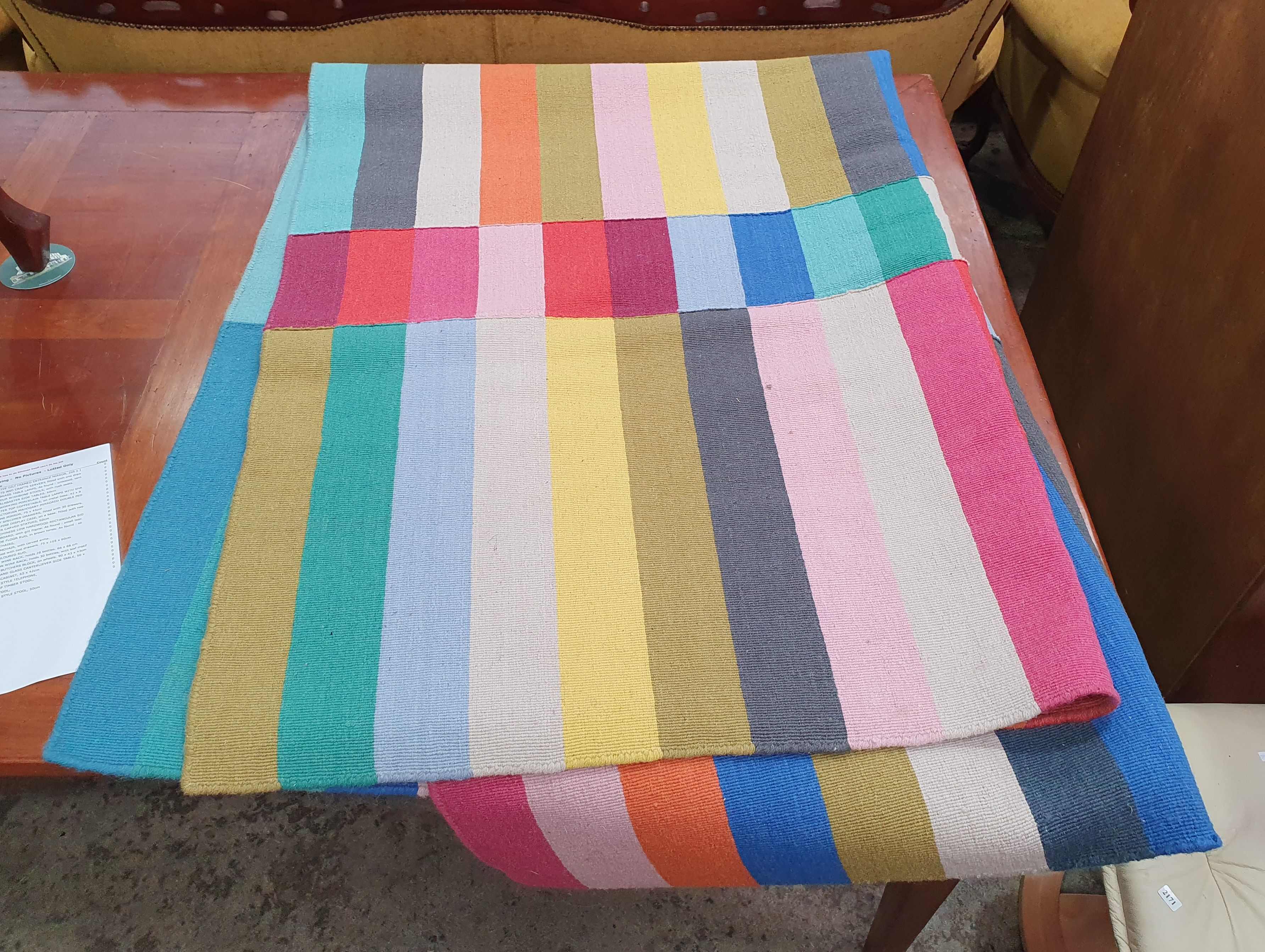 2169 · A MULTI COLOURED RUG