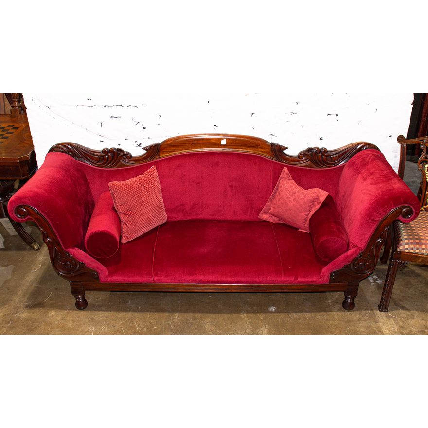A contemporary mahogany Empire style sofa