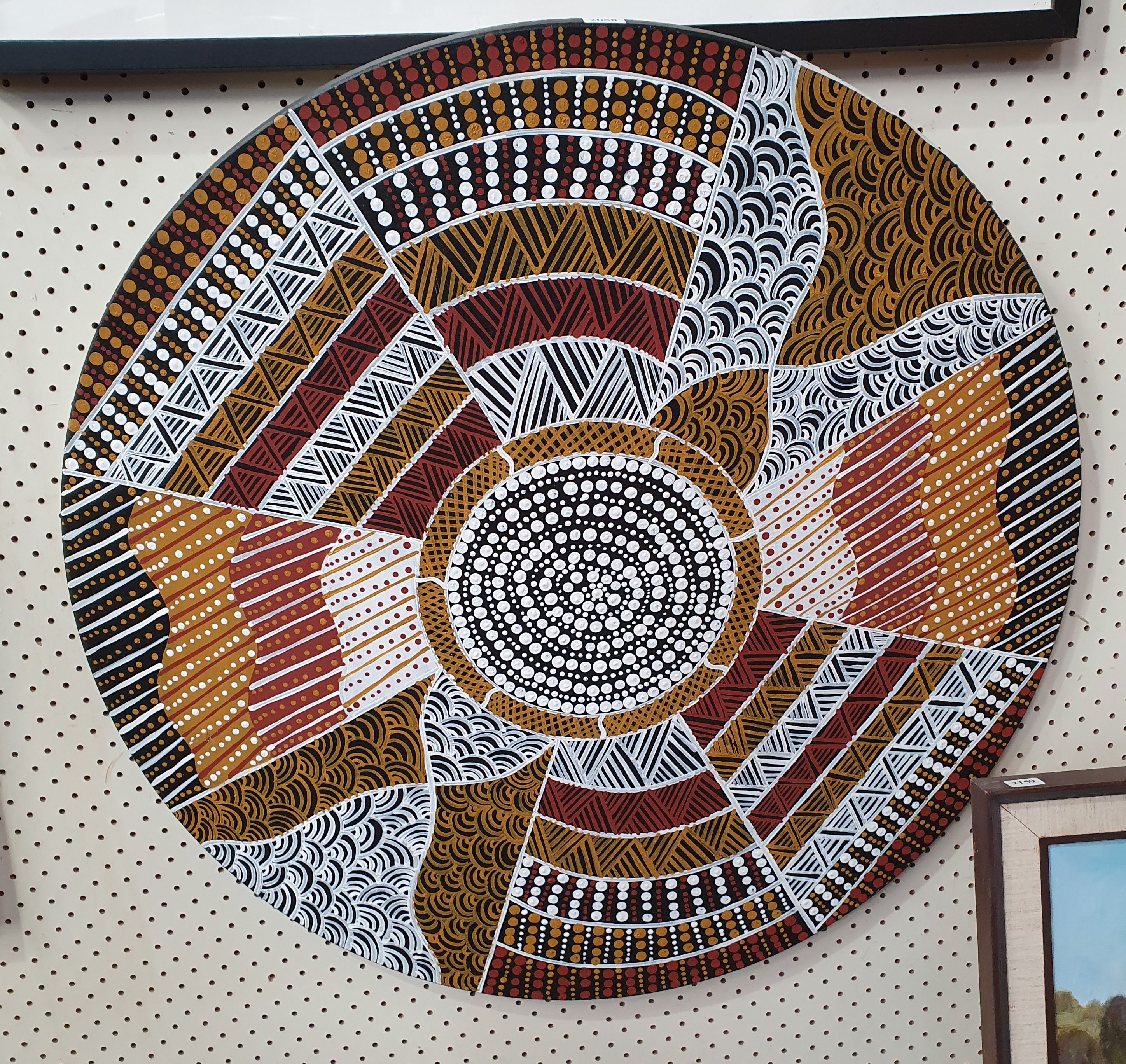 A CIRCULAR INDIGENOUS PAINTING ON CANVAS