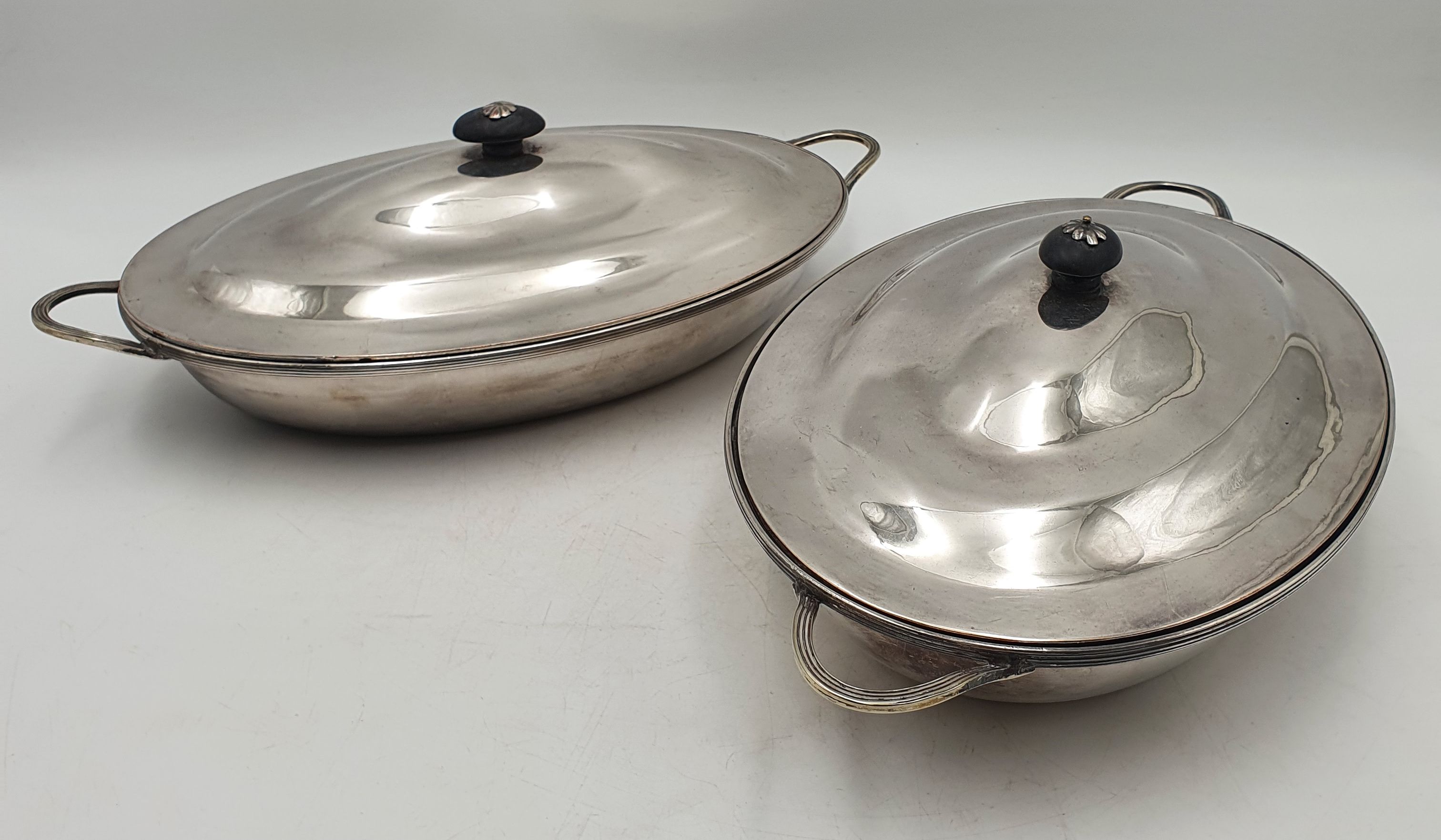 524 · A PAIR OF SHEFFIELD PLATED LIDDED TUREENS