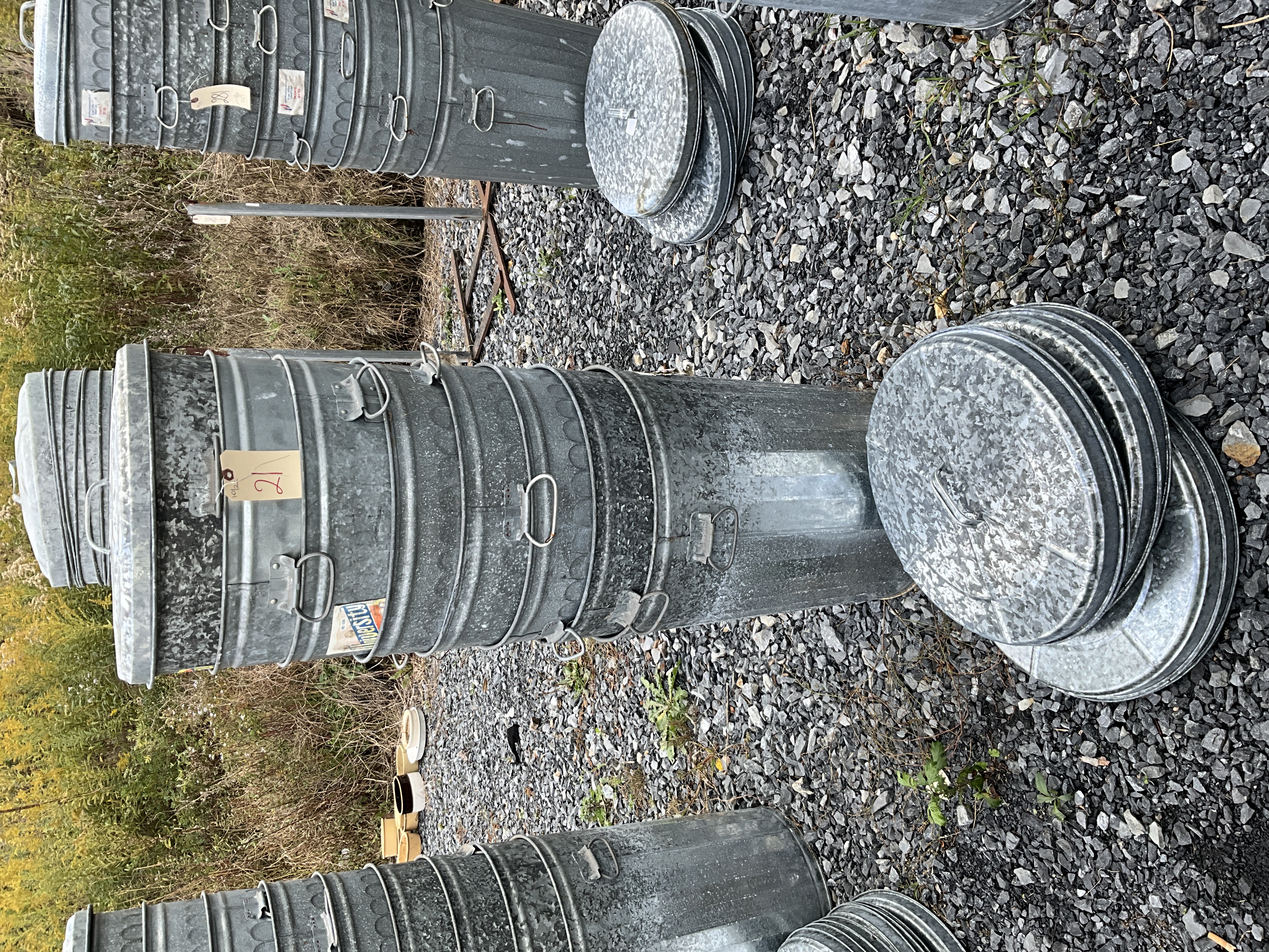 EIGHT 20 GAL. GALVANIZED GARBAGE CANS WITH LIDS Teel Auctions