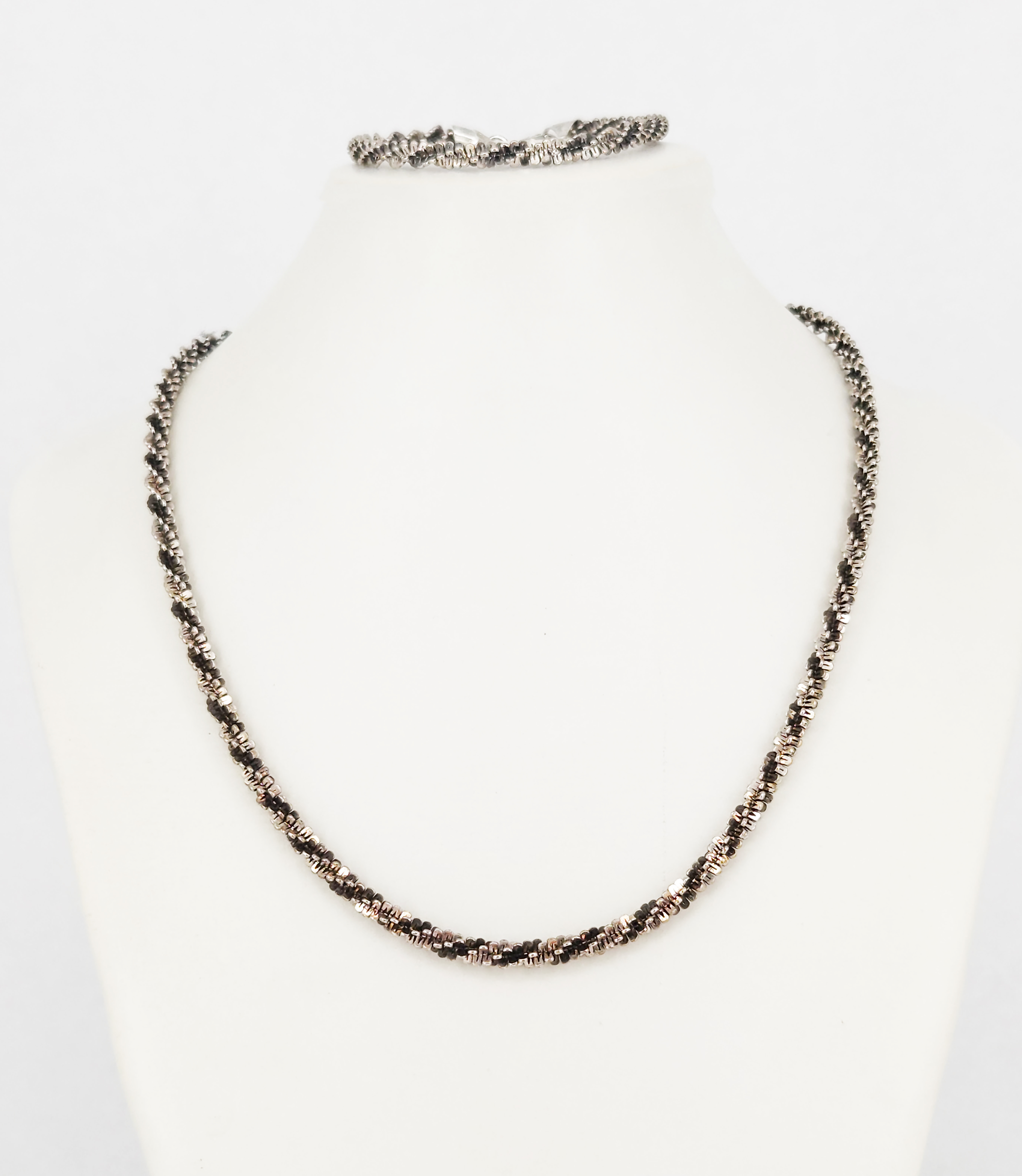 314 · A SILVER FANCY LINK NECKLACE AND MATCHING BRACELET