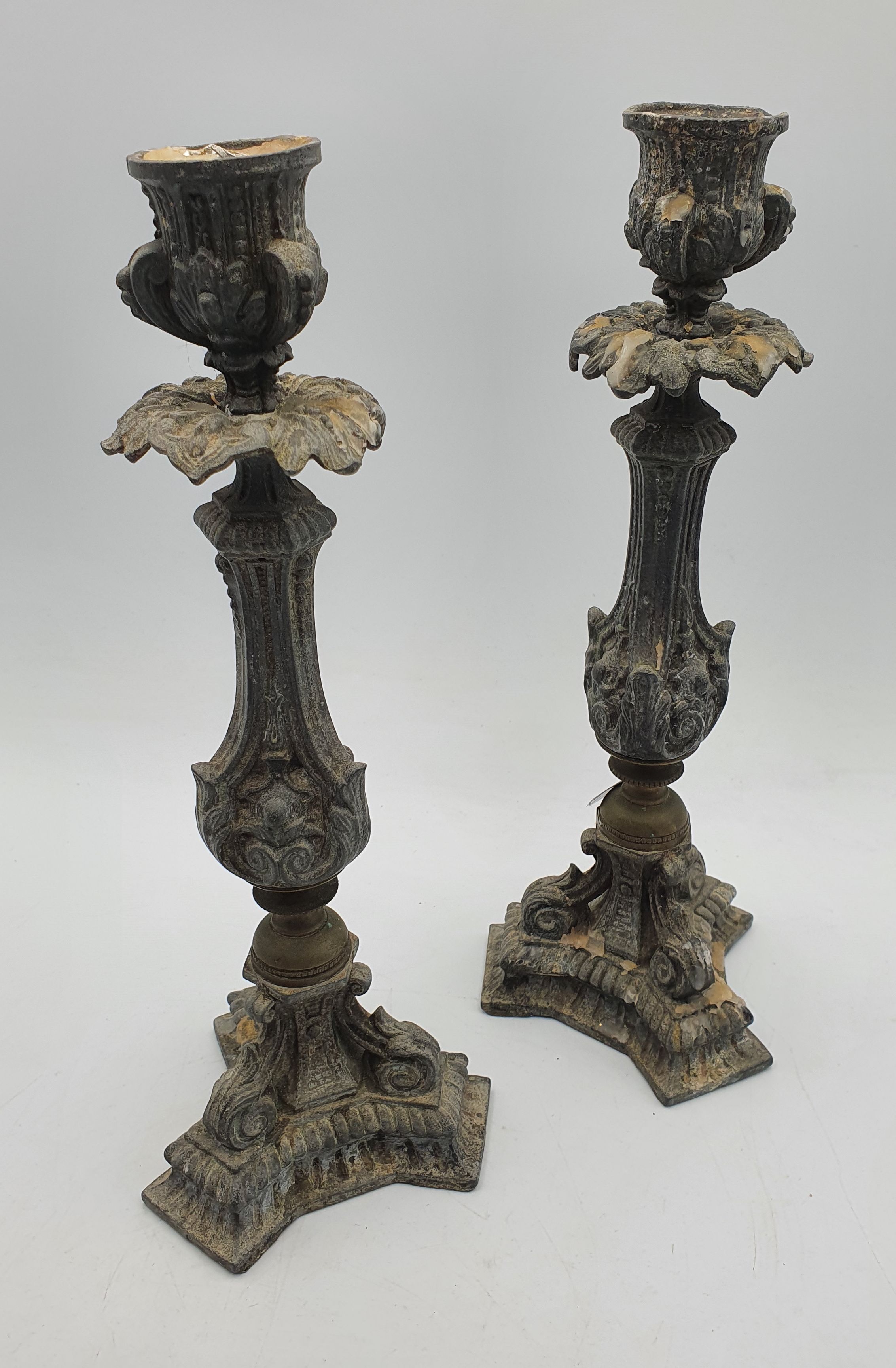 A Pair Of Early 20th Century Metal Candlesticks