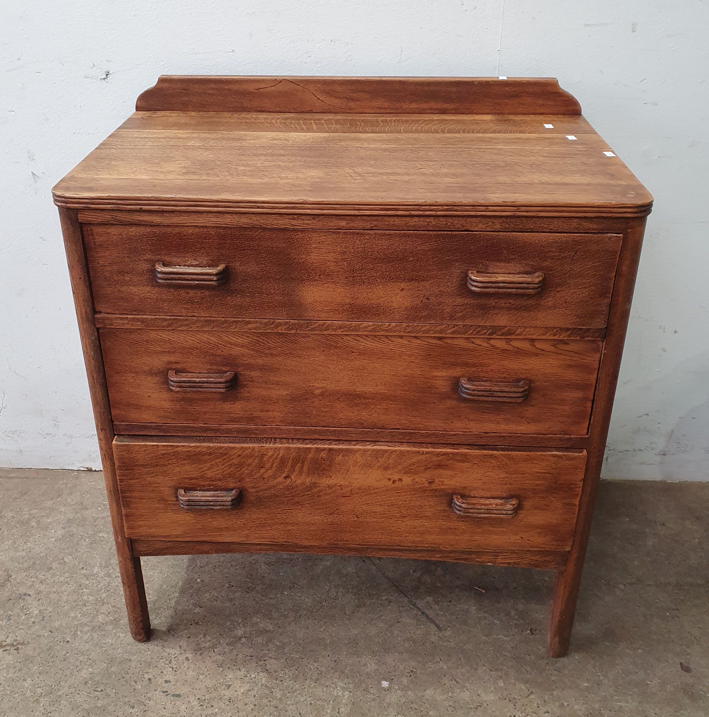An Oak Chest Of Drawers