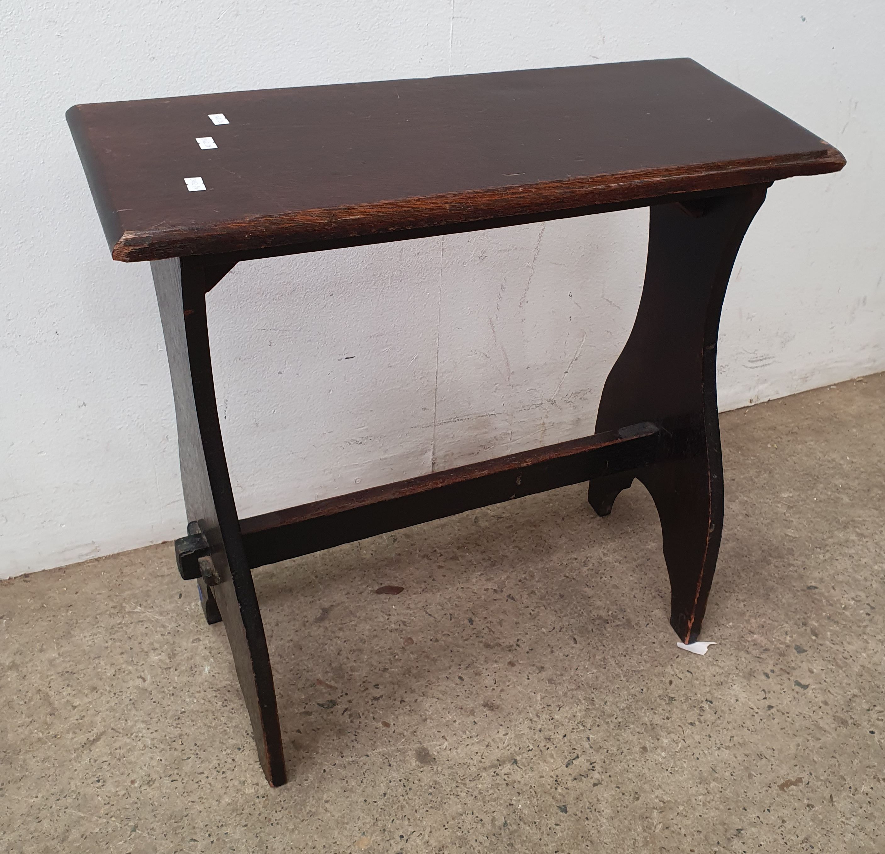 A Wooden Piano Stool