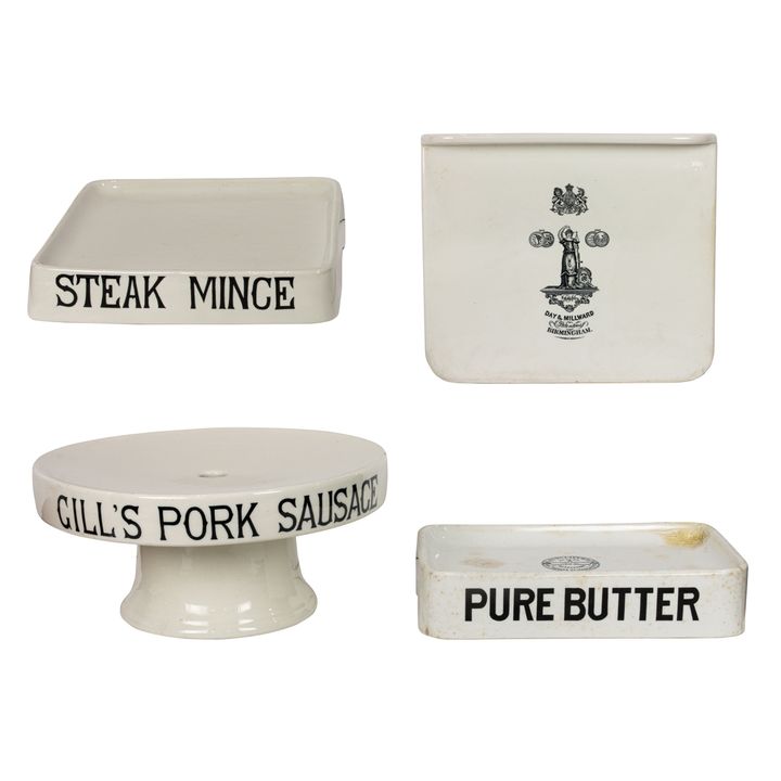 A group of English ironstone advertising display stands