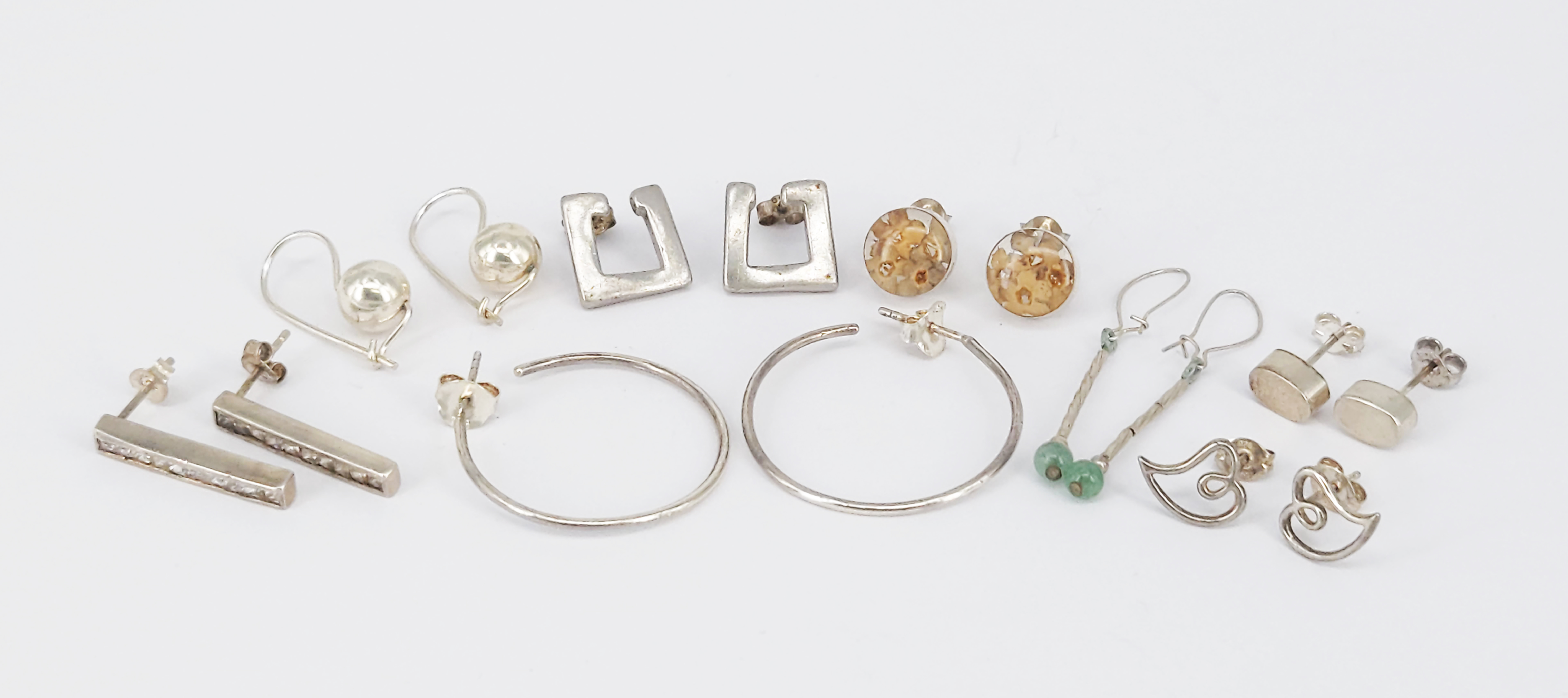 EIGHT PAIRS OF SILVER EARRINGS