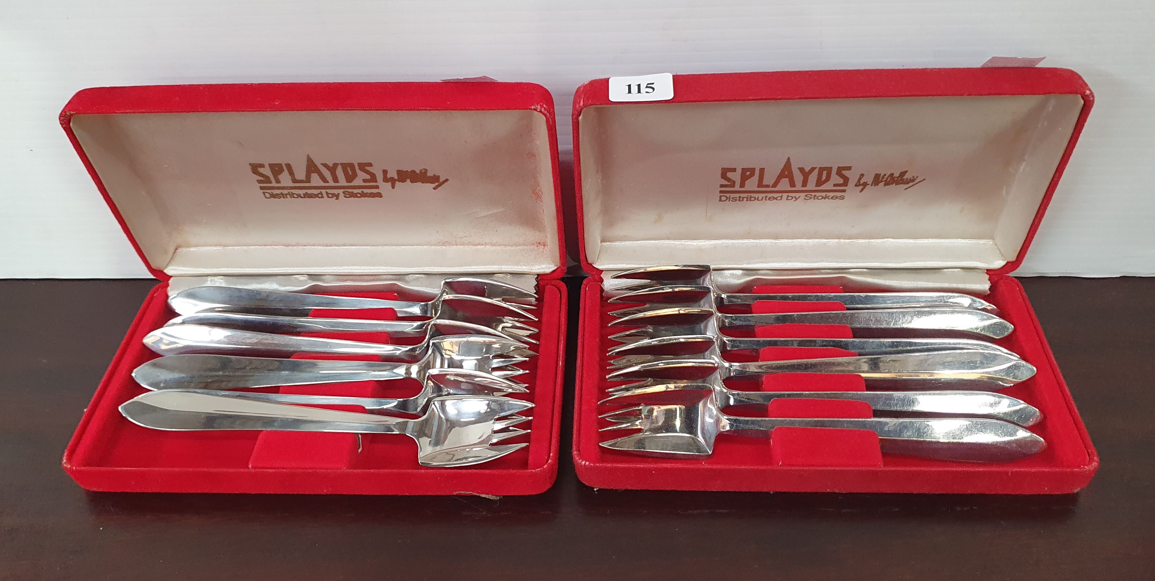 115 · TWO BOXED SPLAYD SETS