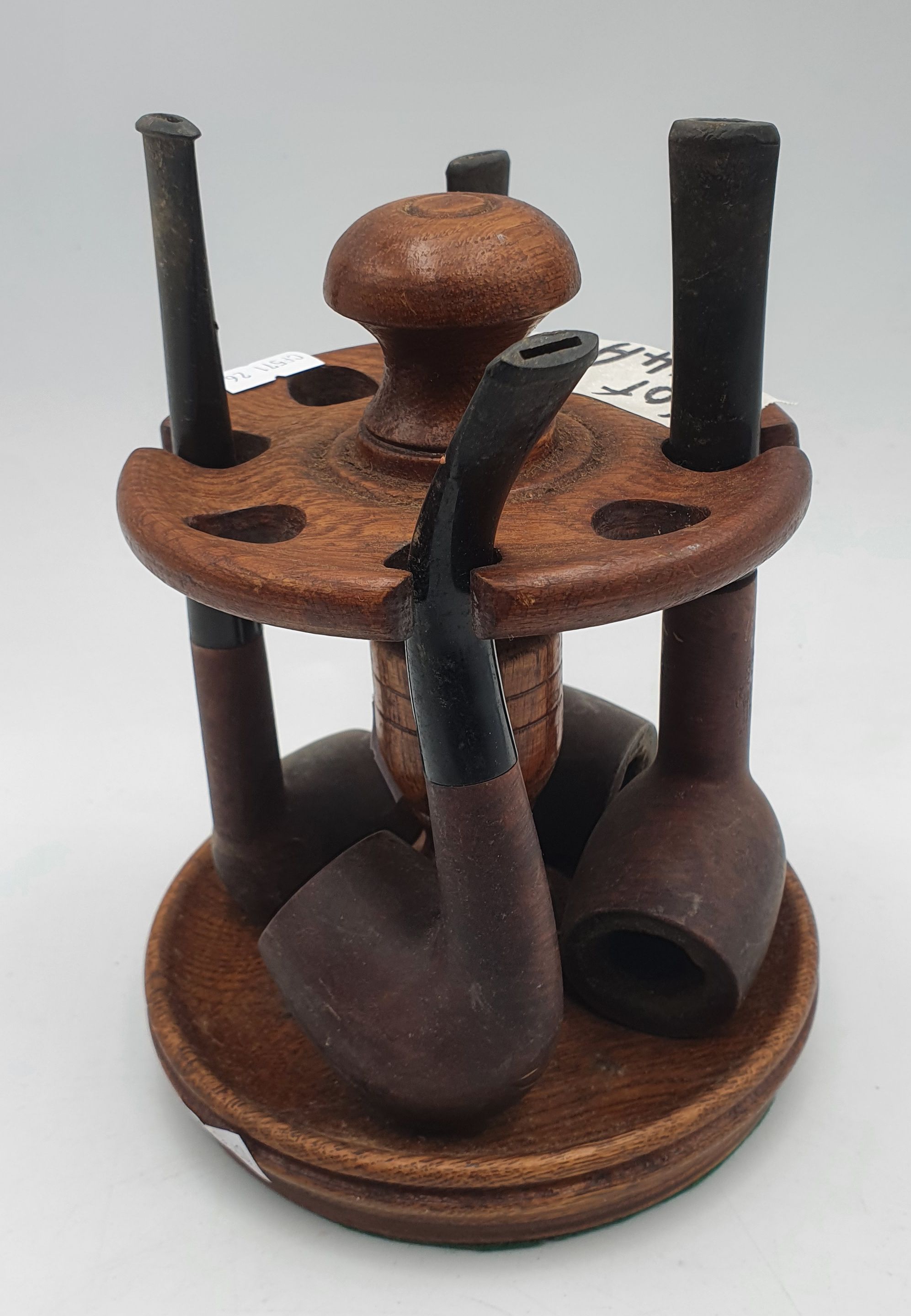 214A · A TIMBER PIPE STAND AND FOUR PIPES