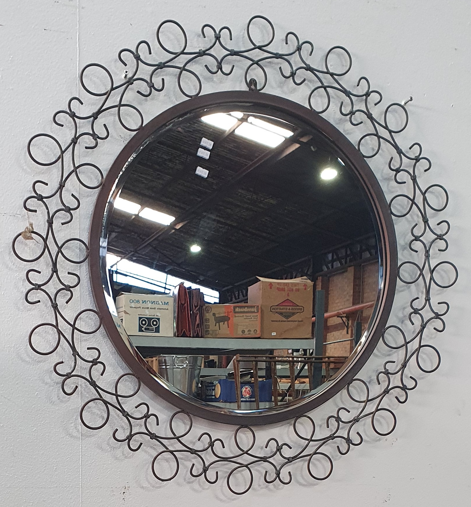 2113 · A METAL FRAMED MIRROR