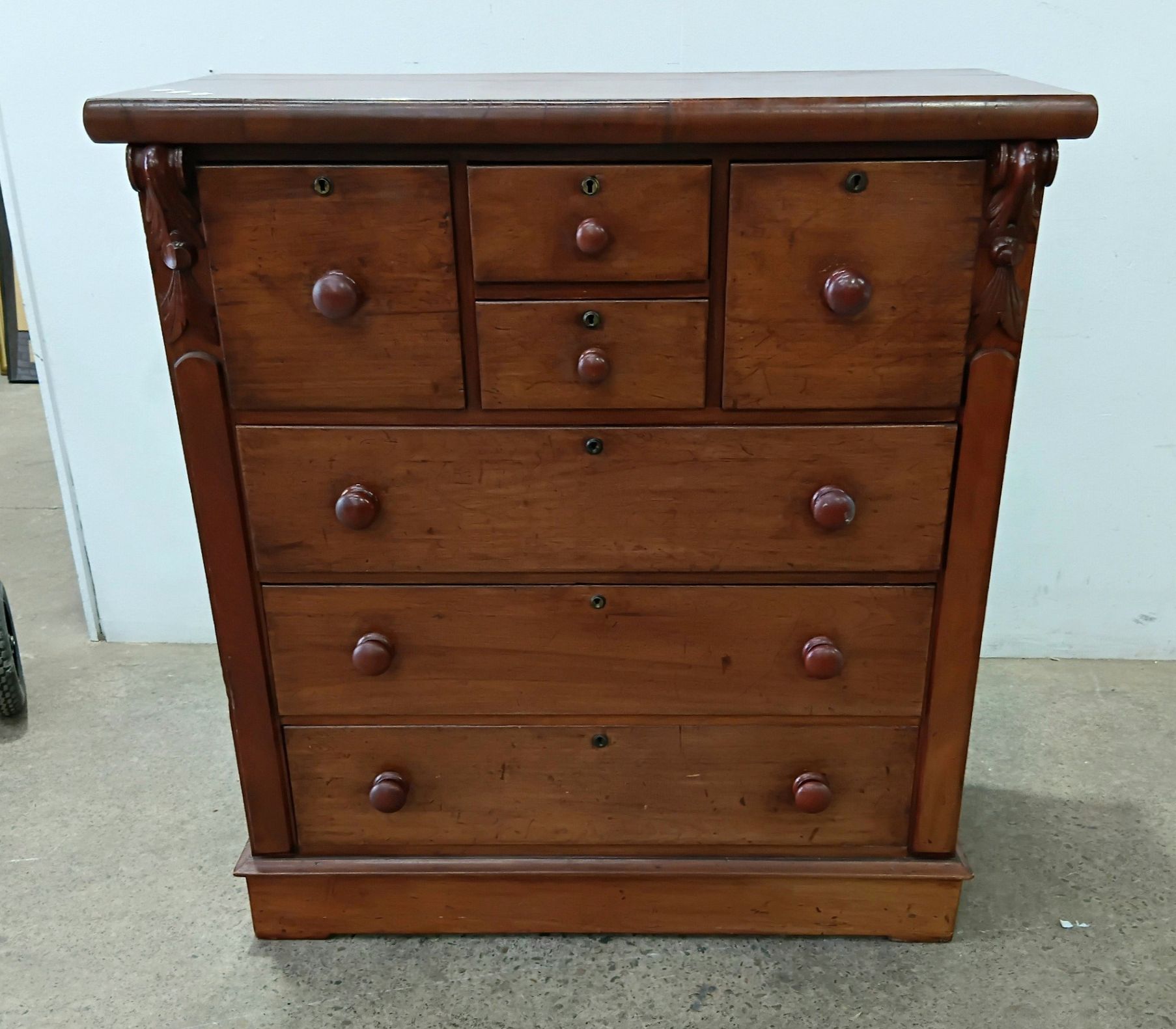 A Colonial Cedar Faced Chest Of Seven Drawers