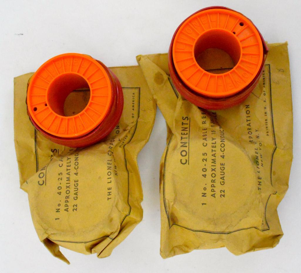 Two Lionel postwar separate sale 40-25 cable reels in envelopes