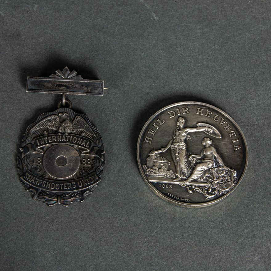 (2) Silver Swiss Shooting Medals: 1890 Swiss medallion "R-1250B" and International Sharpshooters 1888