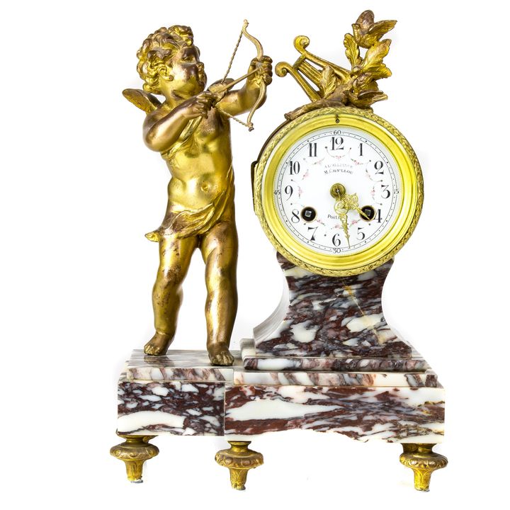 French Louis XV style gilt metal and variegated marble figural clock