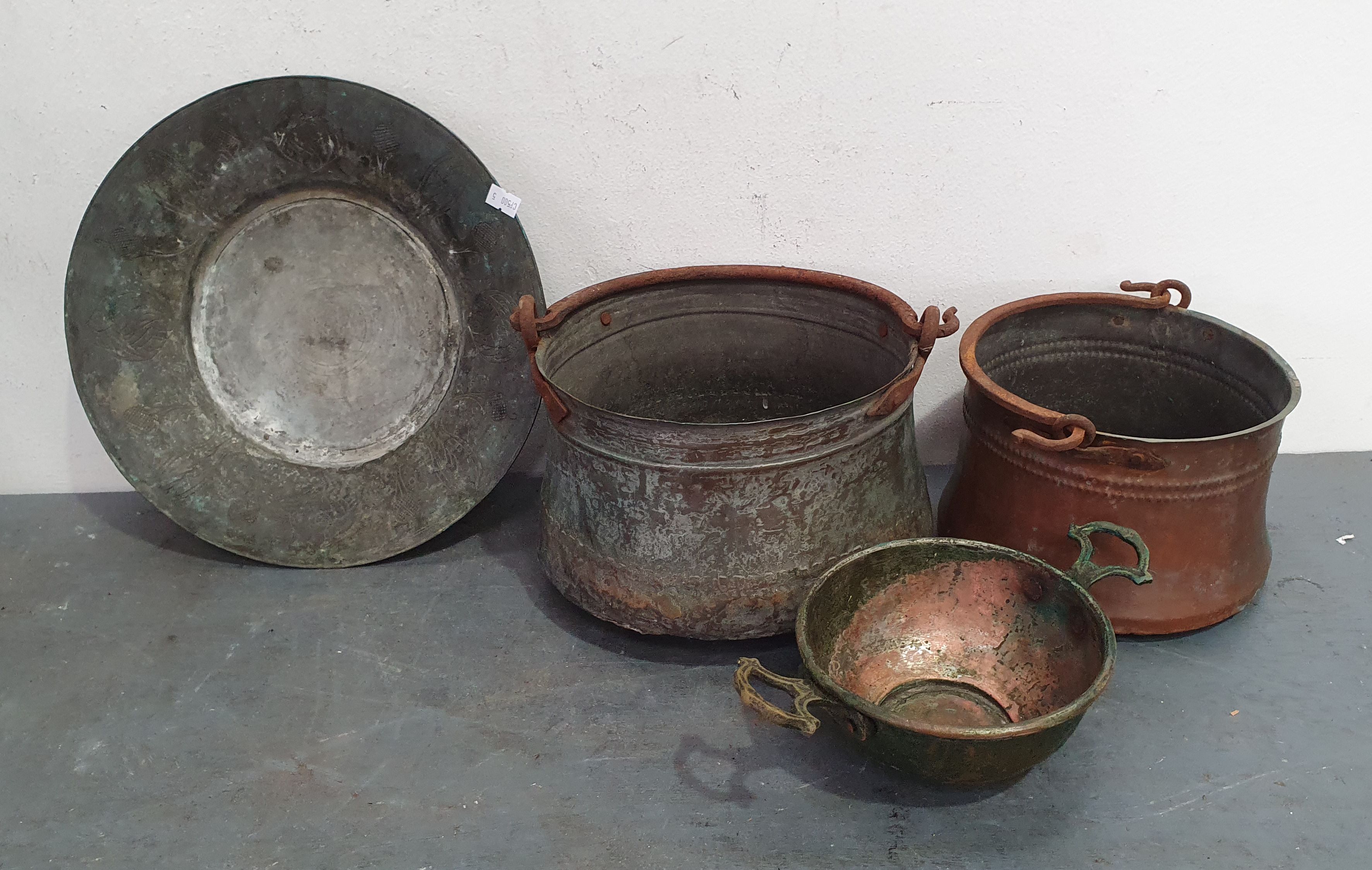 A Group Of Copperware