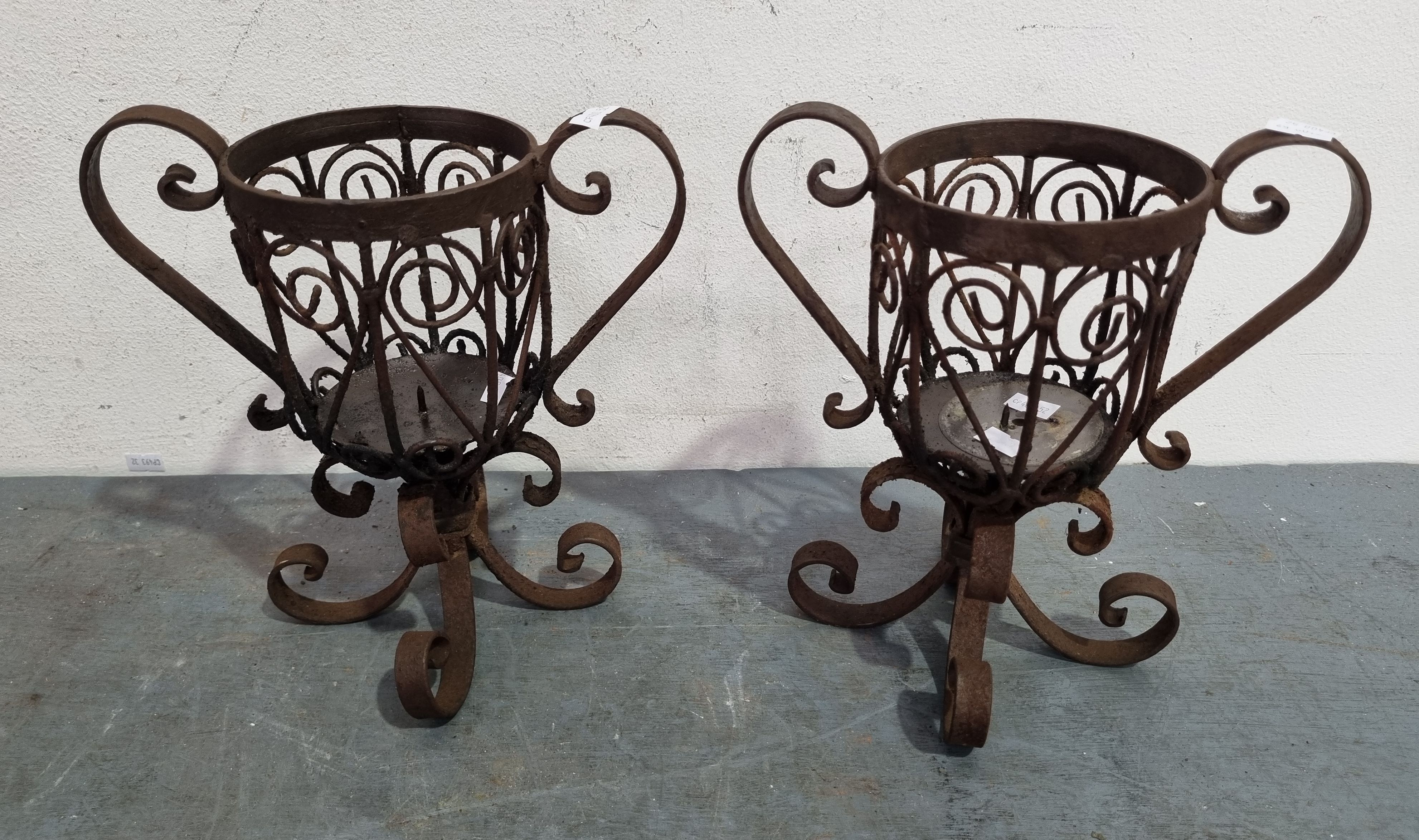 A PAIR OF CANDLE HOLDERS