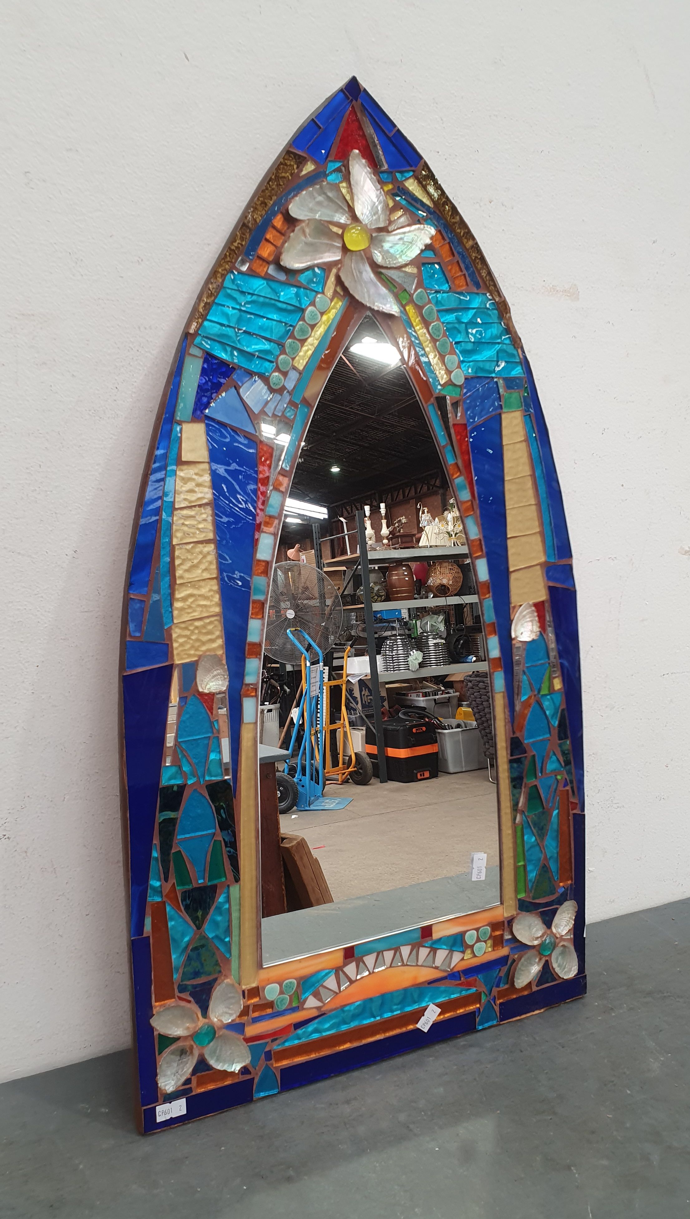 An Arched Mosaic Mirror