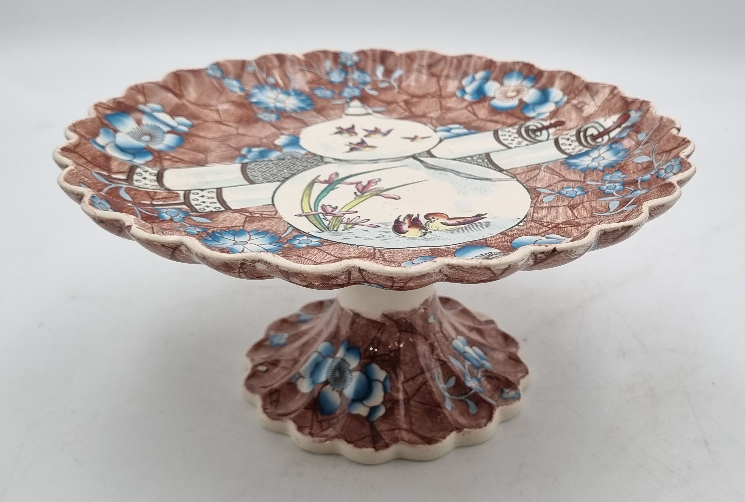 A Scalloped Porcelain Pedestal Cake Stand
