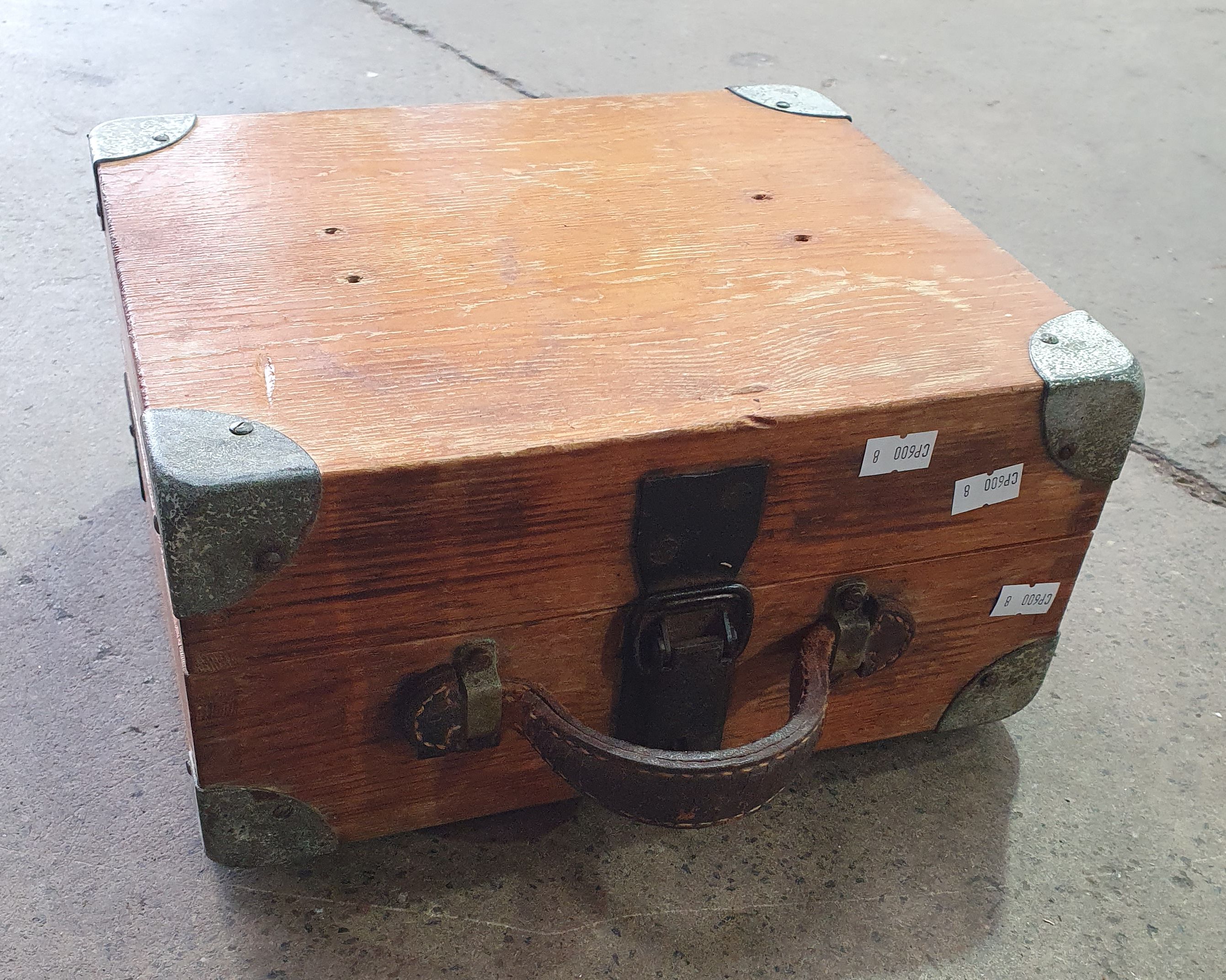 A SMALL VINTAGE TIMBER SUITCASE