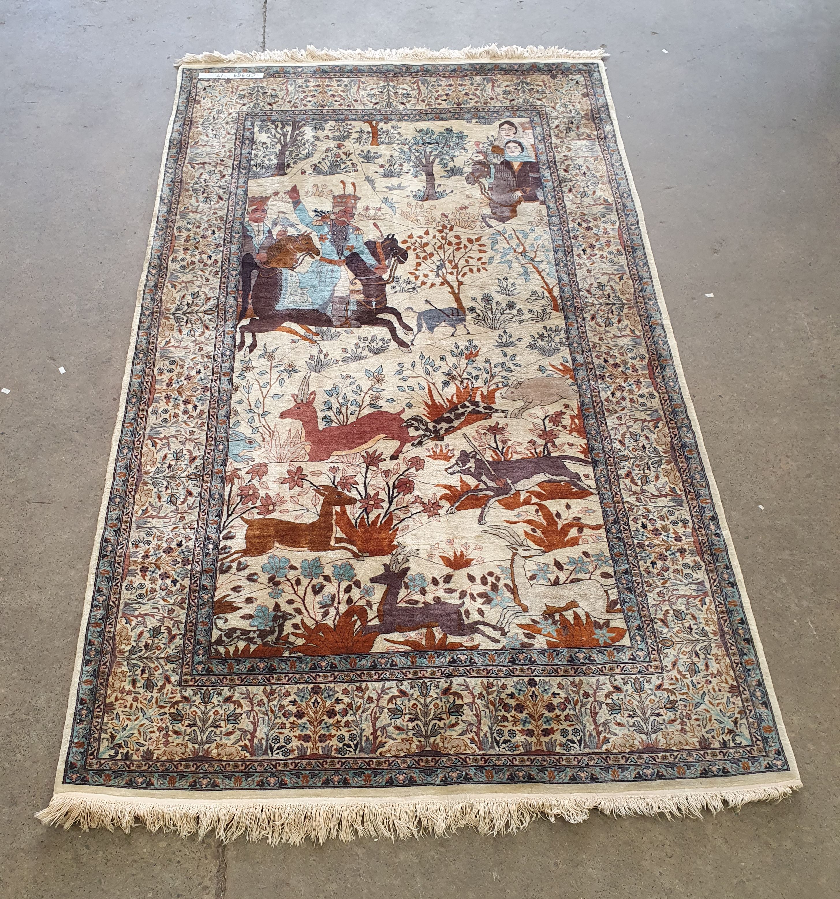 A Persian Wool Hunting Rug