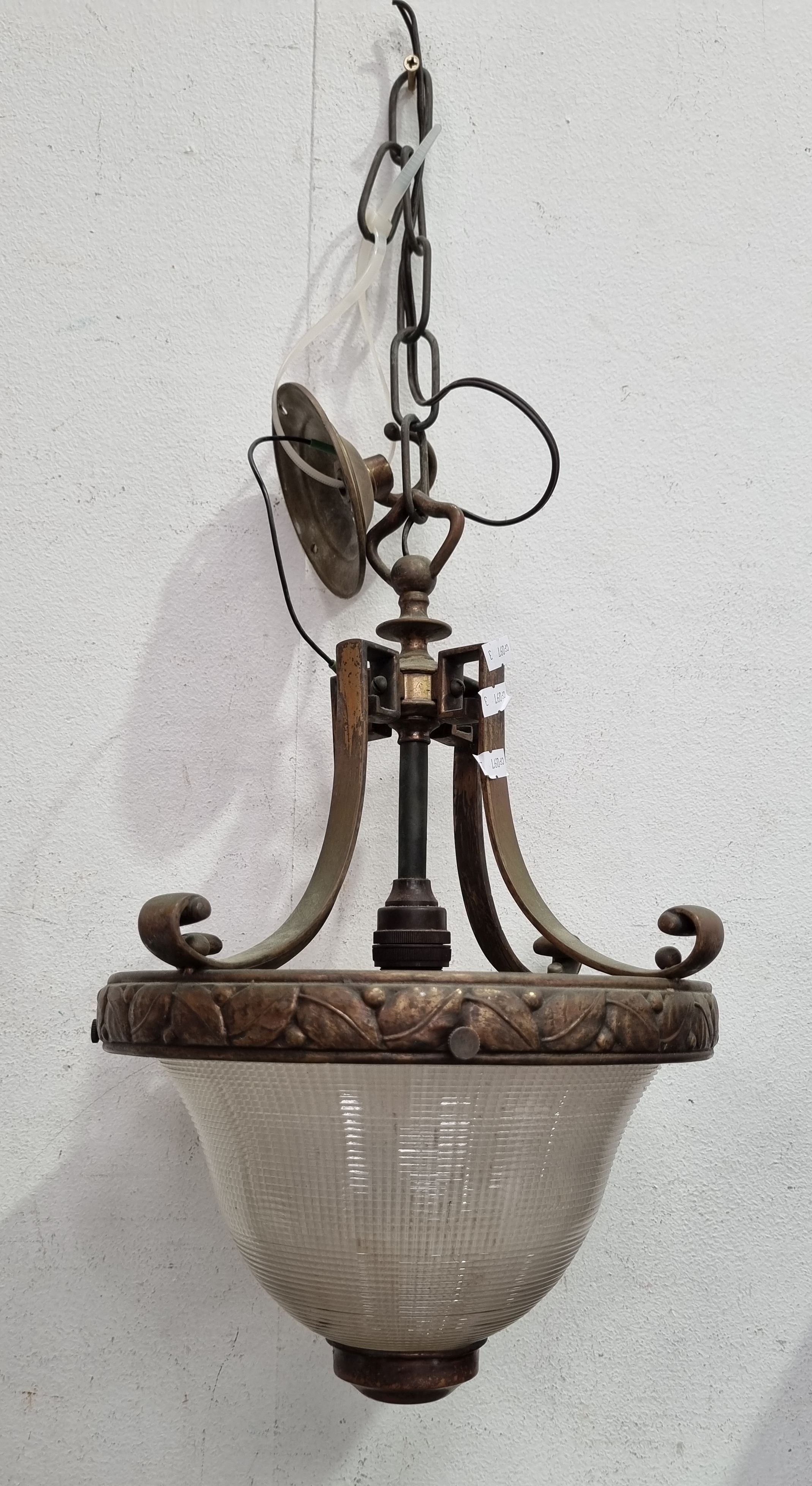 A BRASS AND TEXTURED GLASS LIGHT