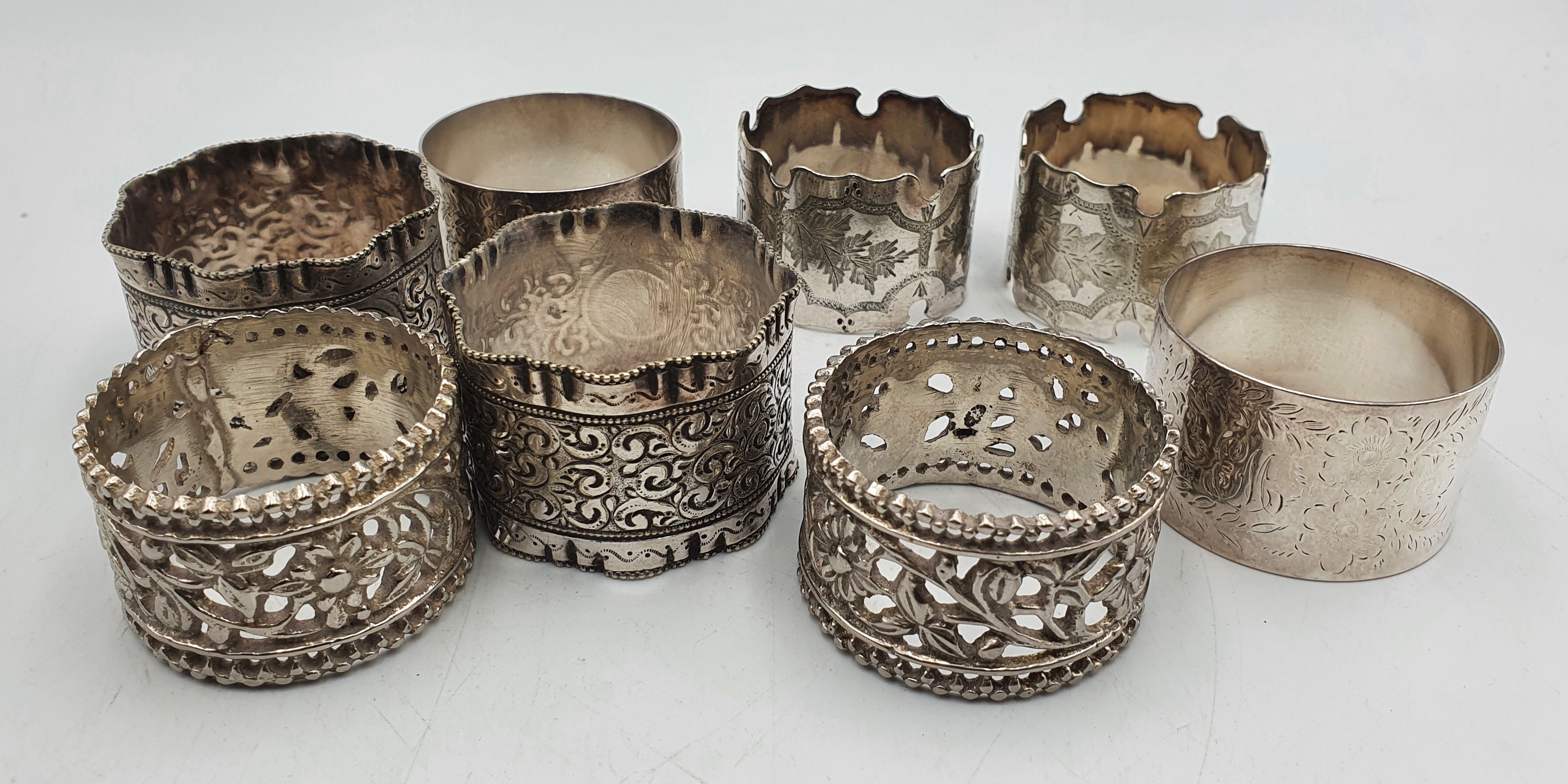 185 · FOUR PAIRS OF SILVERPLATED NAPKIN RINGS