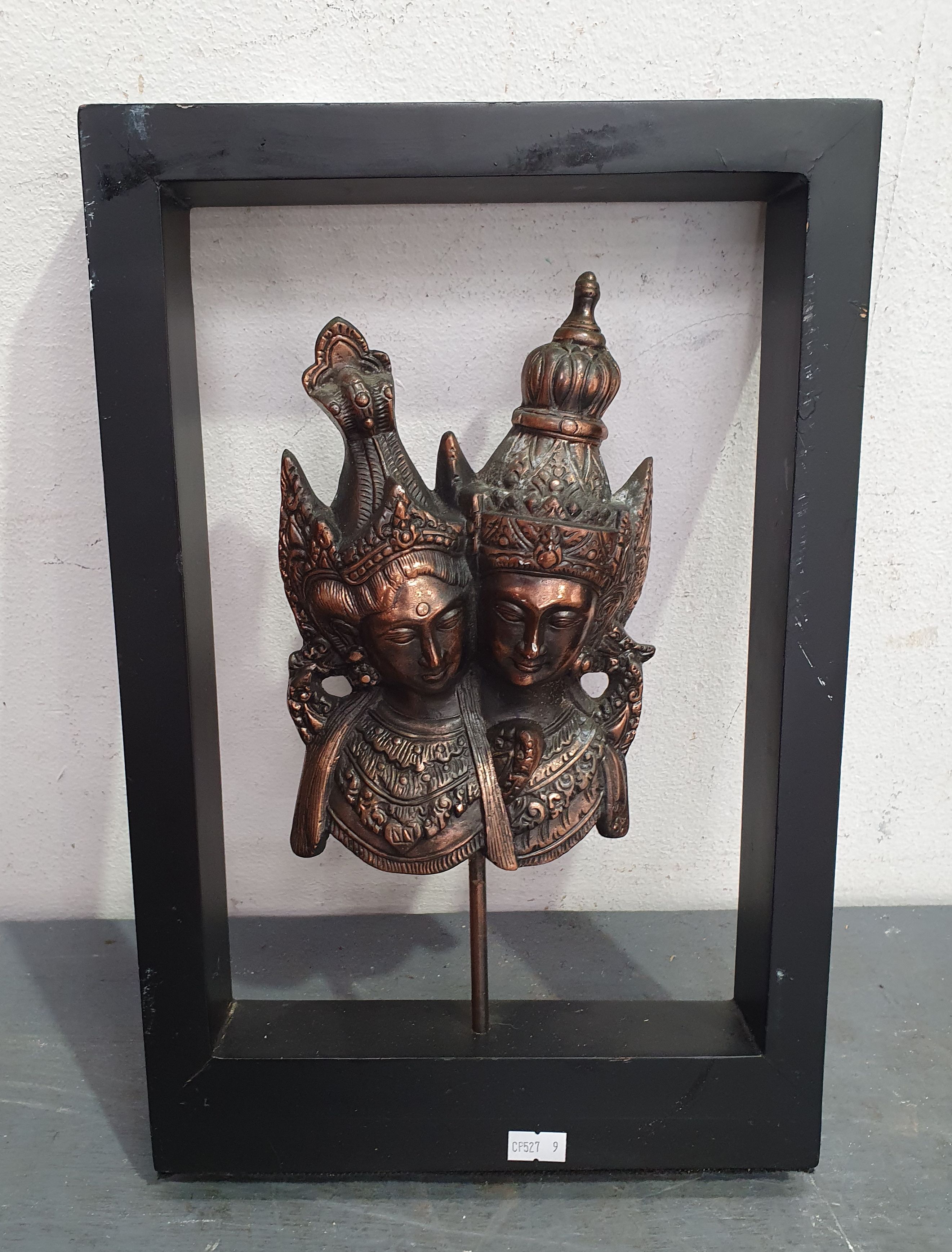 A CAST METAL ASIAN STYLE FRAMED DECORATIVE ARTWORK
