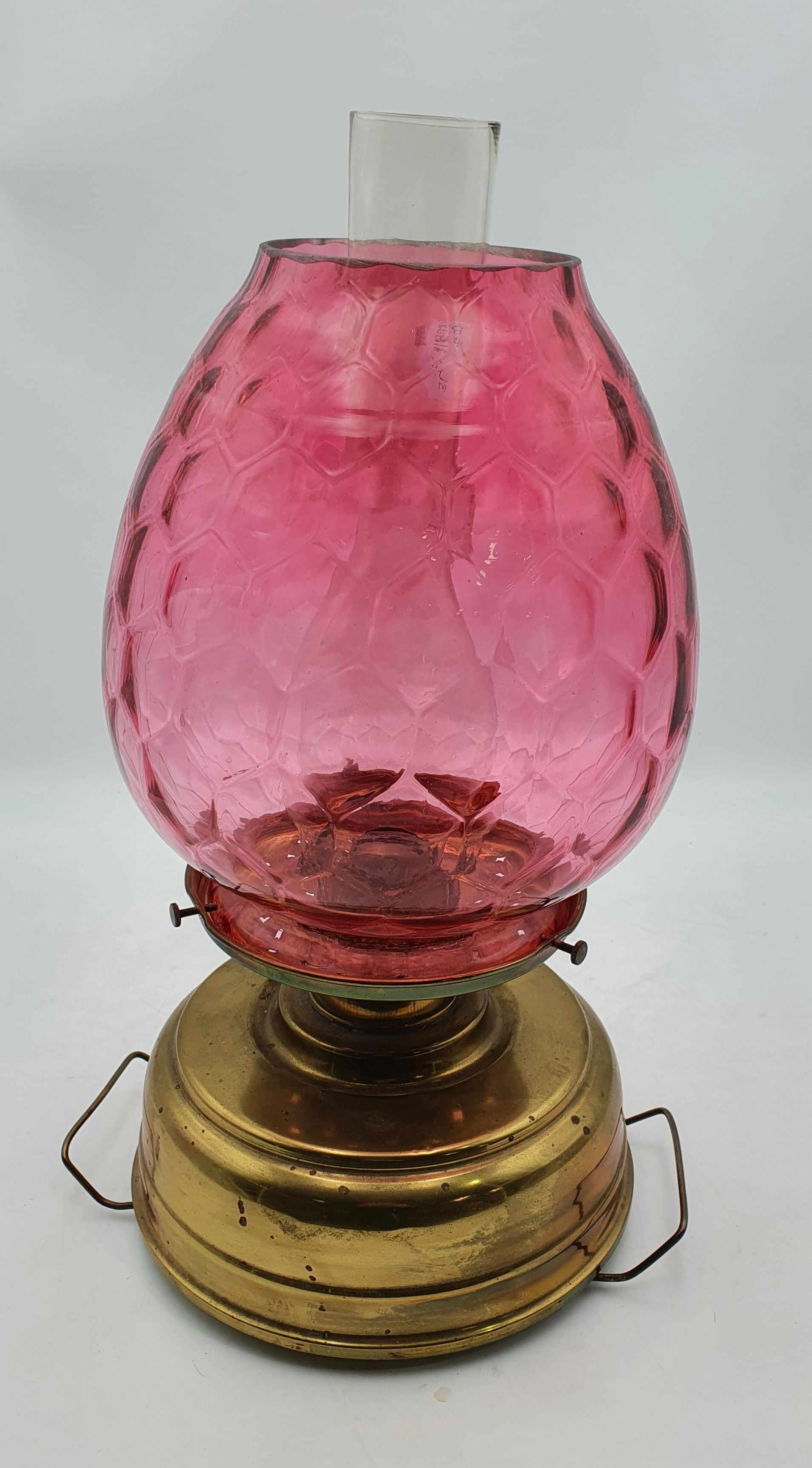 A Vitcorian Ruby Glass Oil Lamp