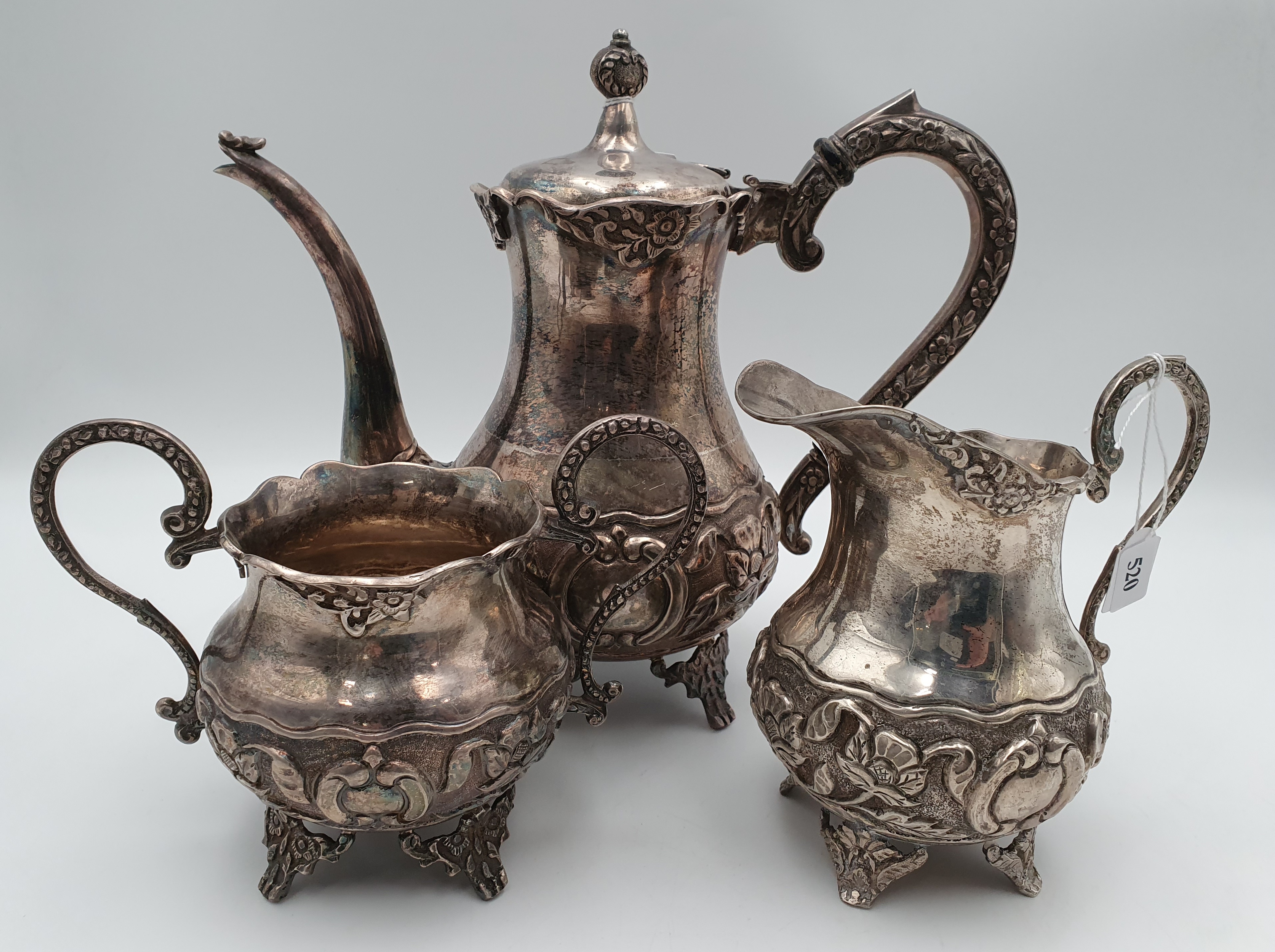 520 · A THREE PIECE SILVER TEASET