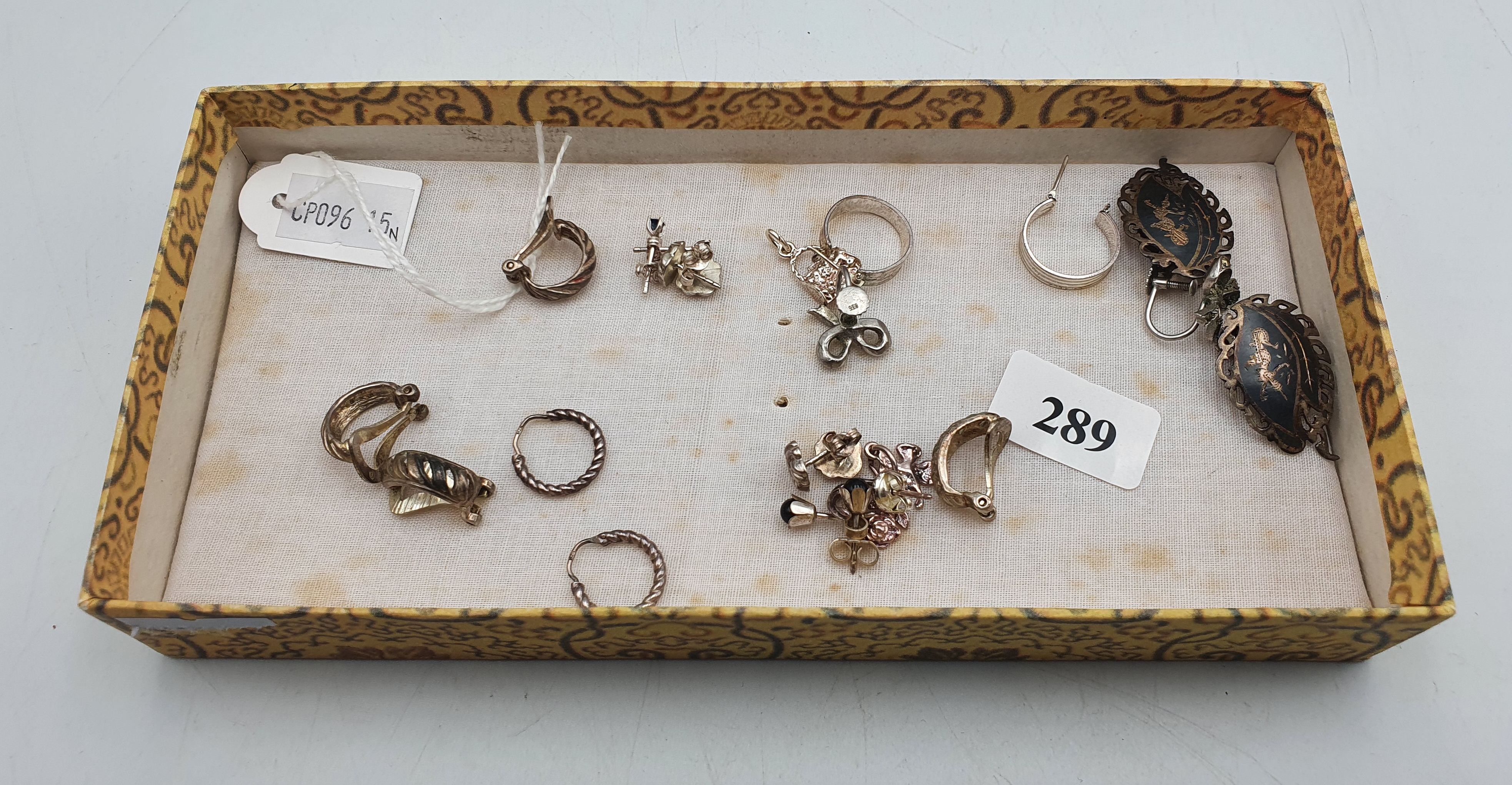 A GROUP OF SILVER EARRINGS