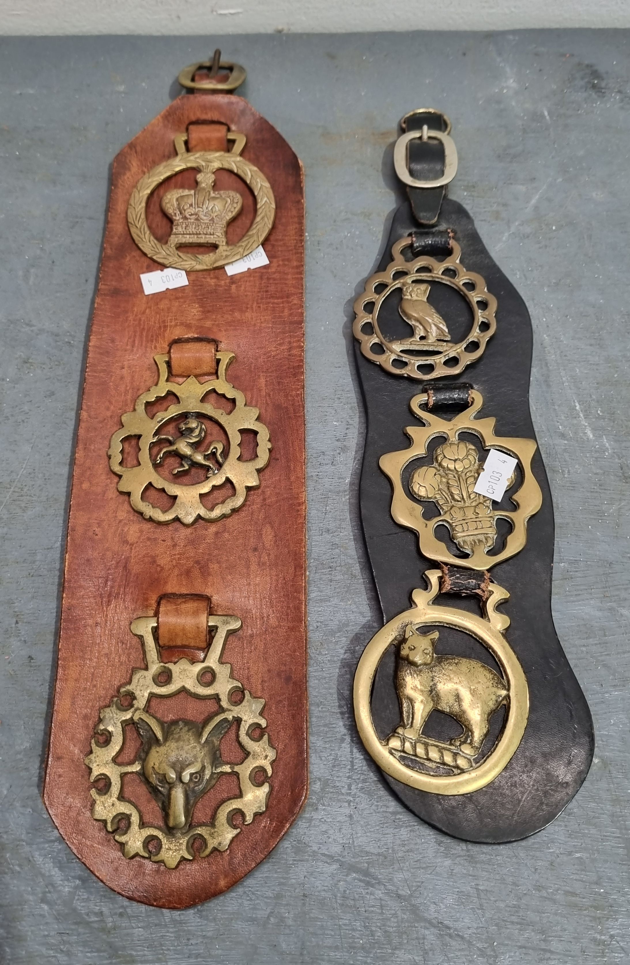 A GROUP OF BELT BUCKLES